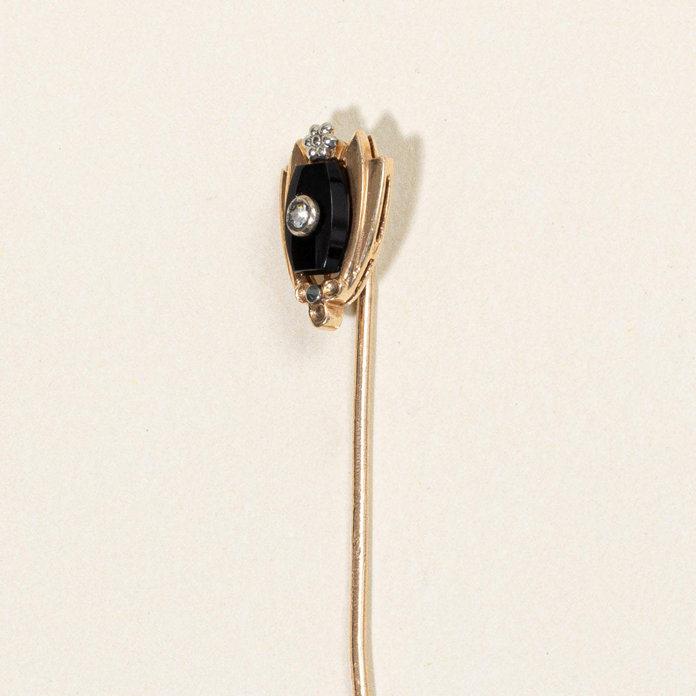 Broche en onyx et diamants | 0,25 ct, 0,01 ct |