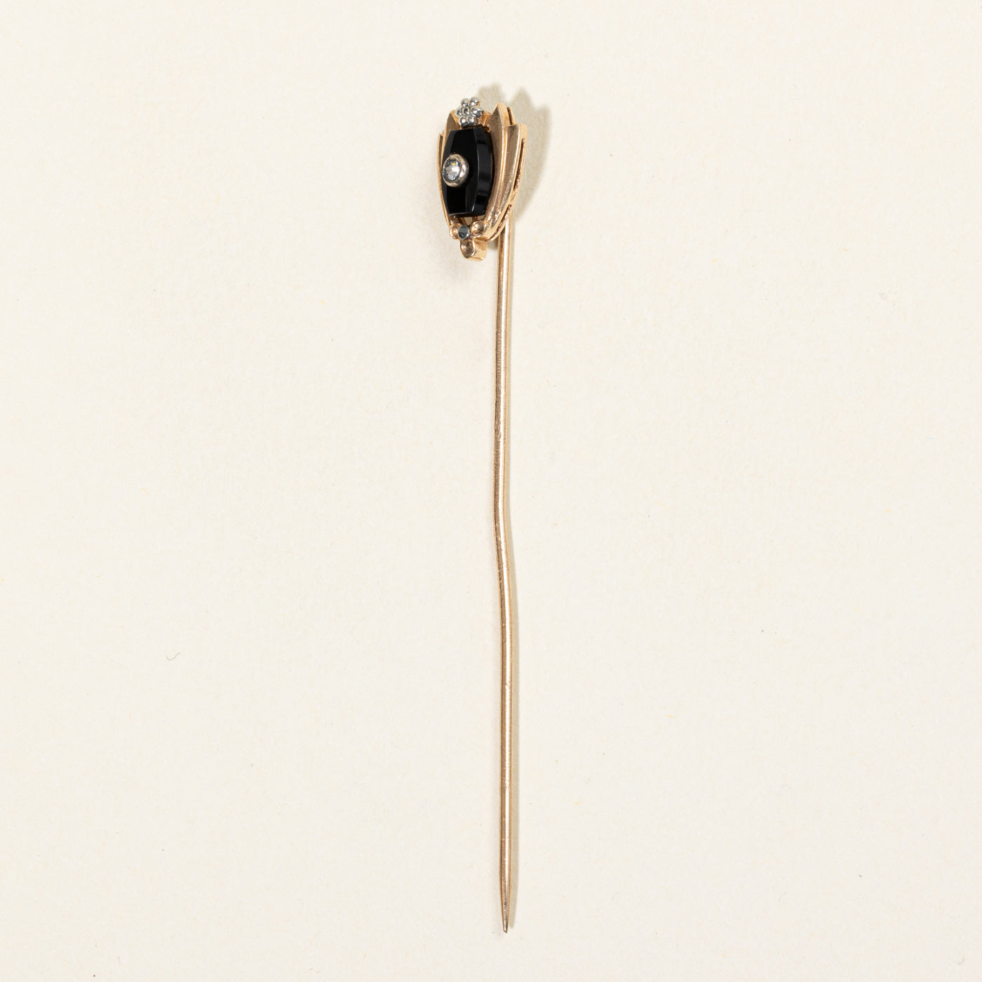 Broche en onyx et diamants | 0,25 ct, 0,01 ct |