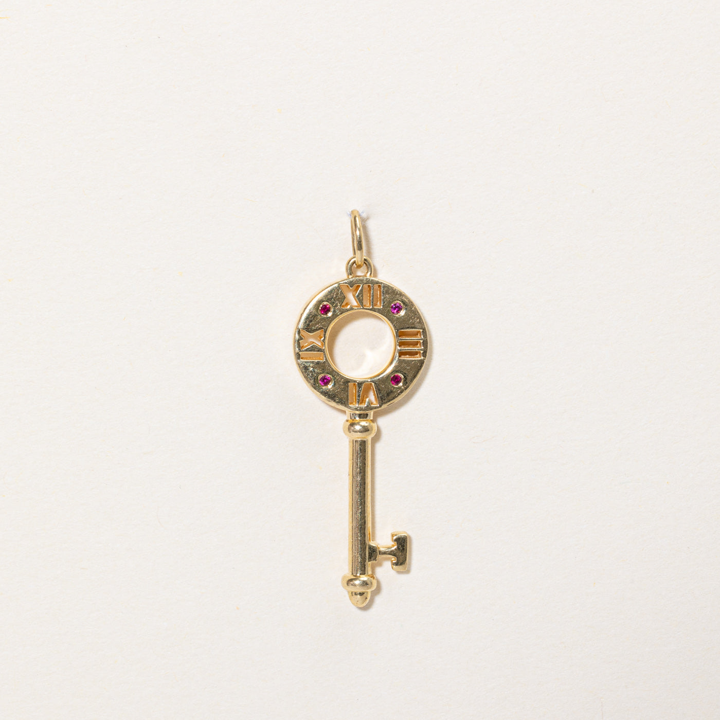 Tiffany & Co' 18k Atlas Pierced Key with Ruby Pendant | 0.01ctw |