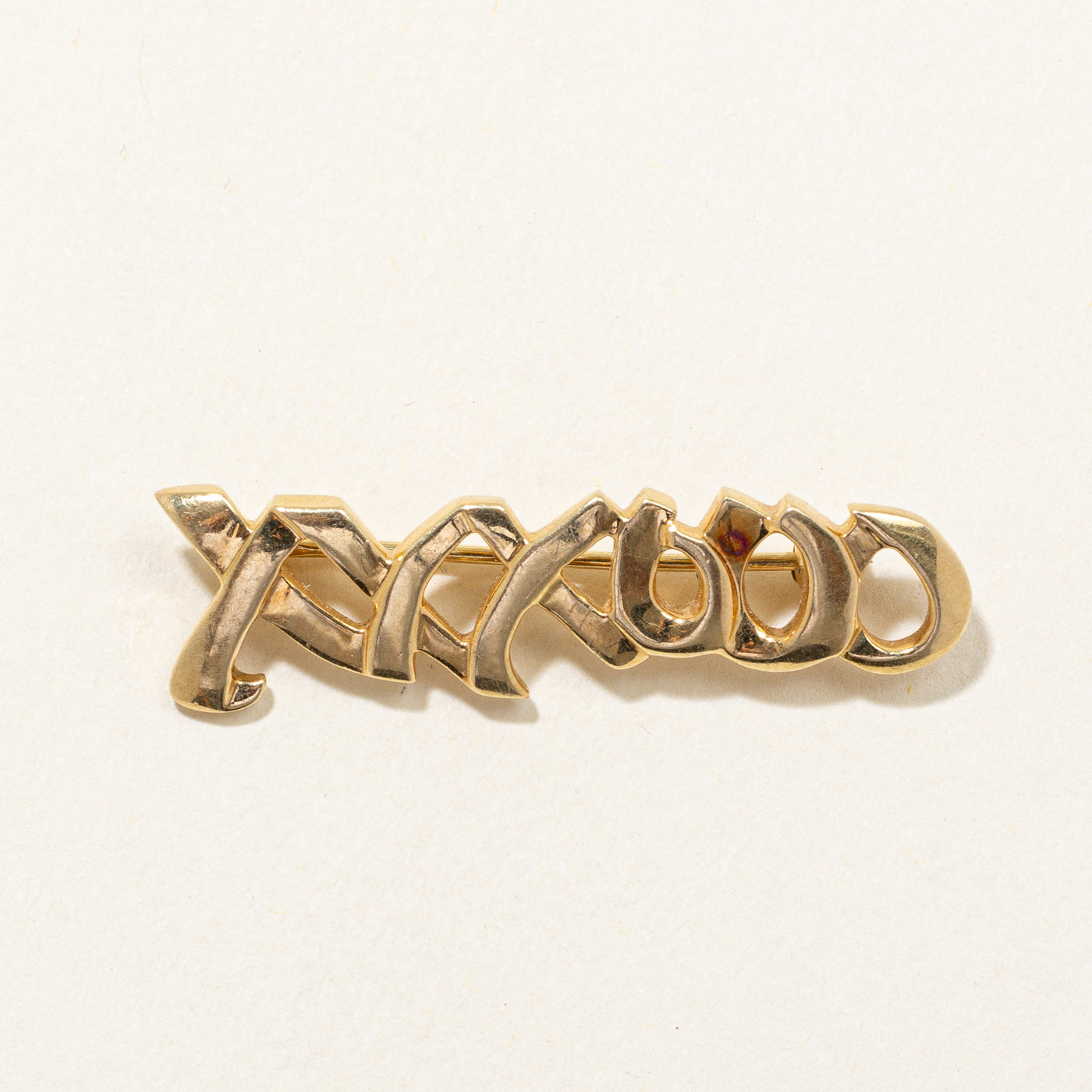 Broche « Bisous d’amour » Paloma Picasso en or 18 carats, signée Tiffany & Co. (1983).