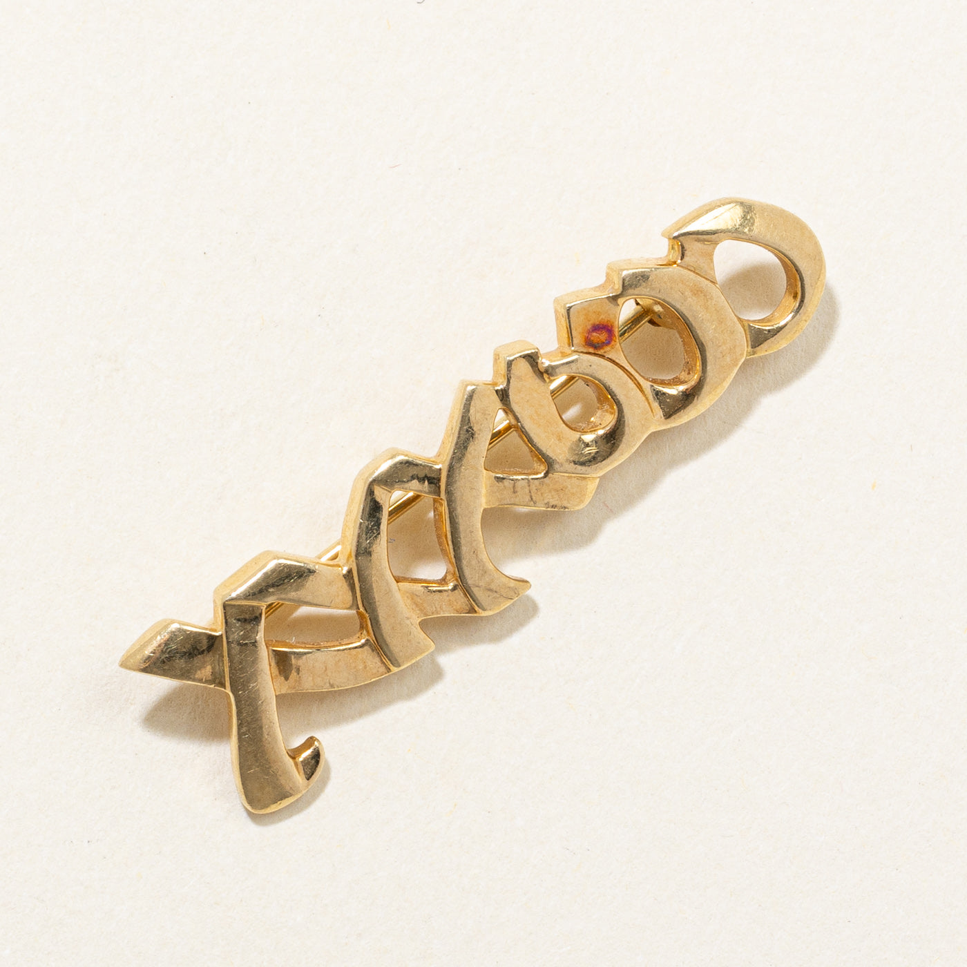 Broche « Bisous d’amour » Paloma Picasso en or 18 carats, signée Tiffany & Co. (1983).