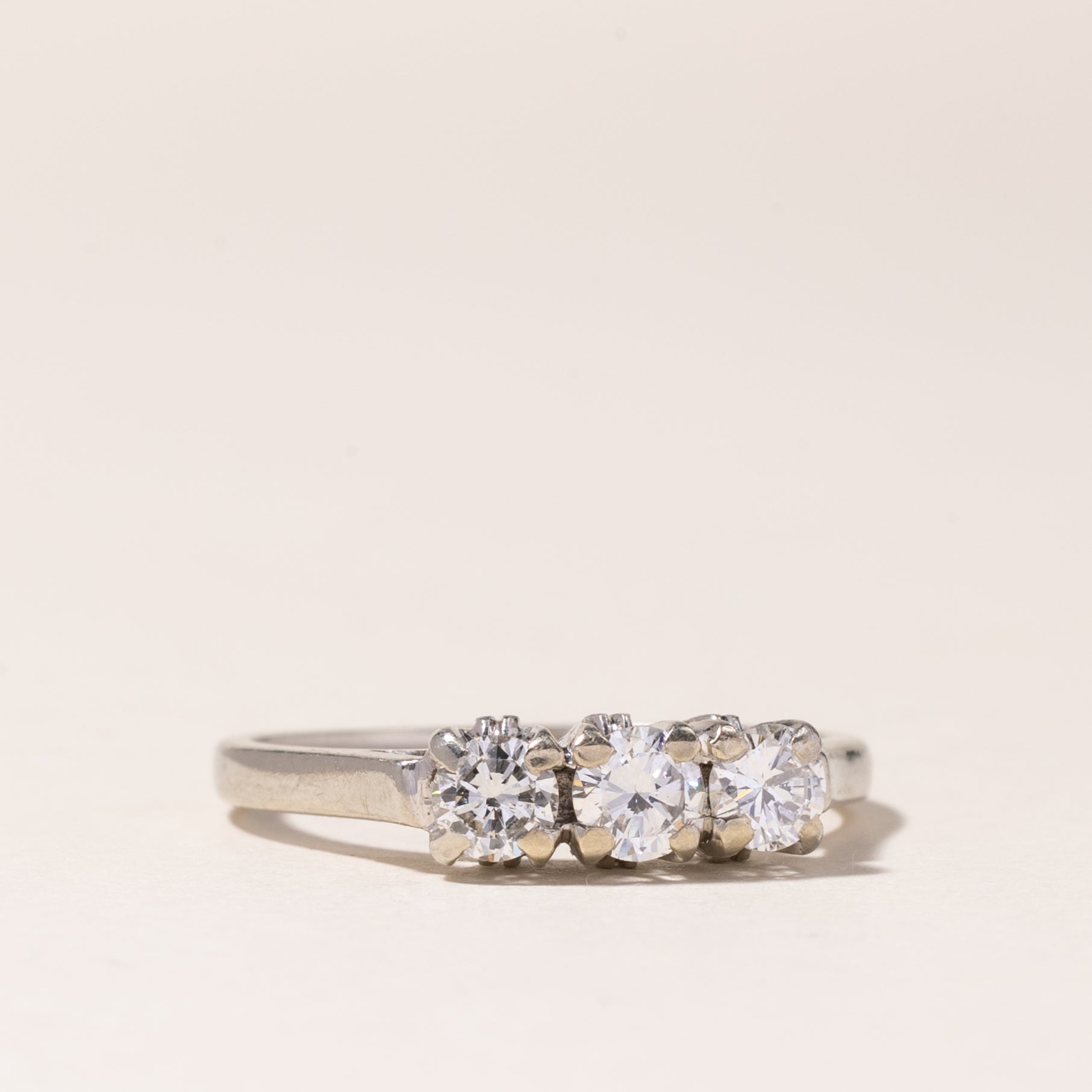 18K White Gold Three Stone Diamond Ring | 0.57ctw | SZ 7.5 |