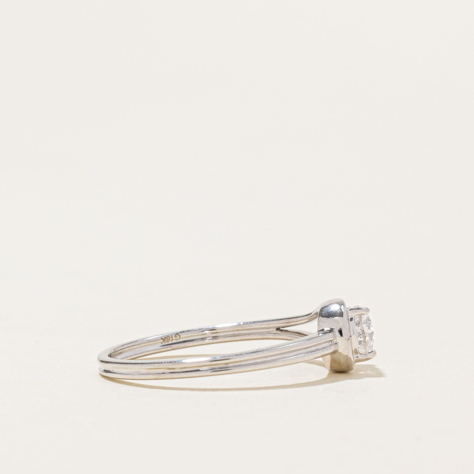 Bague boucle en diamant taille poire IGI Antwerp East West | 0,47 ct | Taille 6,5