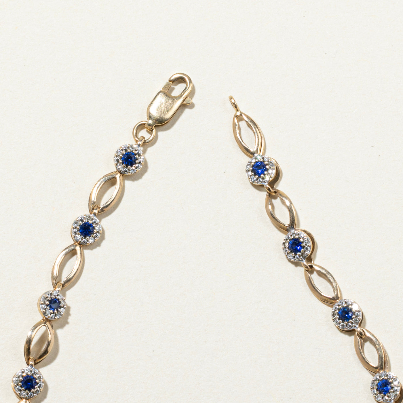 Blue Sapphire & Diamond Halo Bracelet | 0.30ctw, 0.80ctw | 7.5"