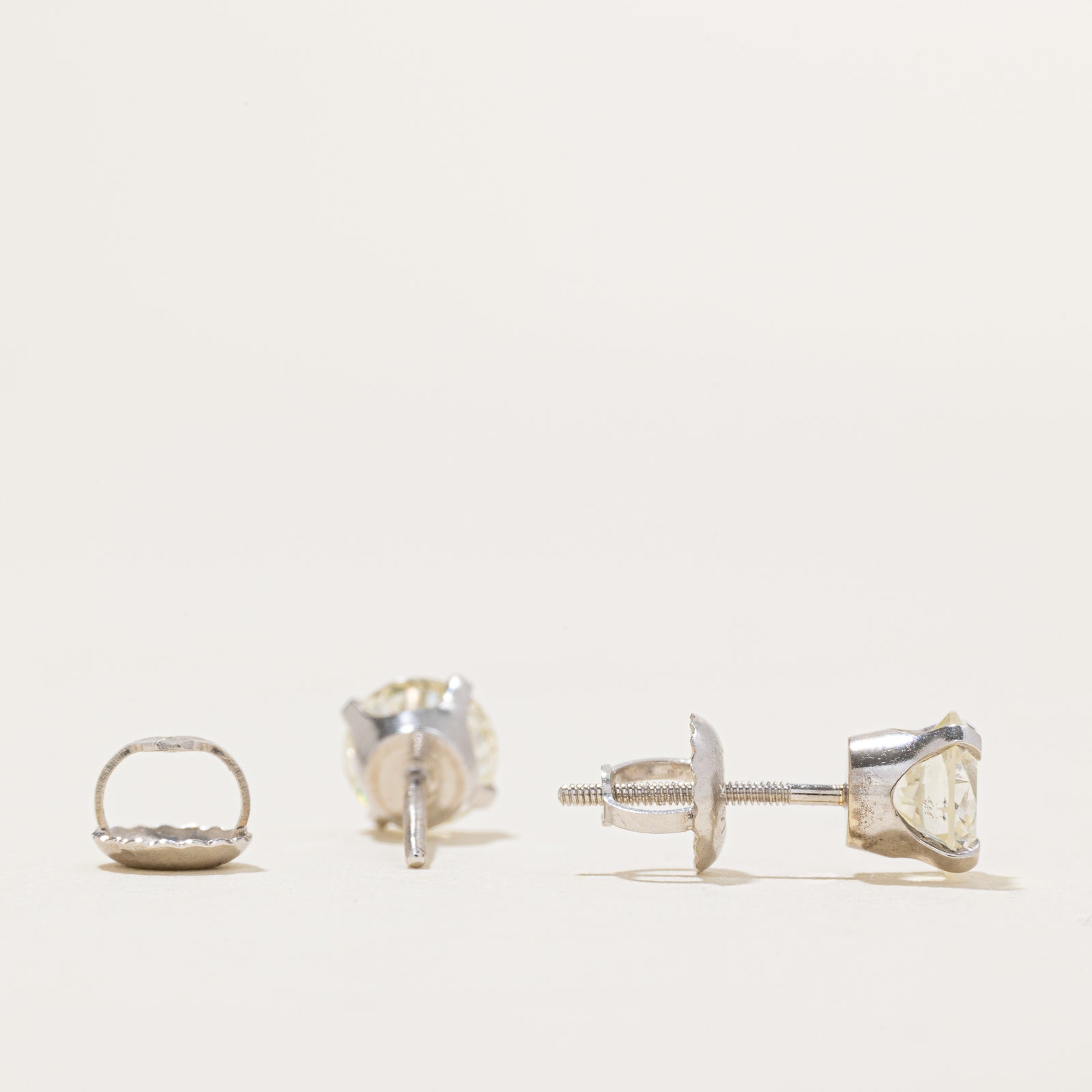 Solitaire Round Brilliant Diamond Stud Earrings | 1.20ctw SI1/SI2 L/M |
