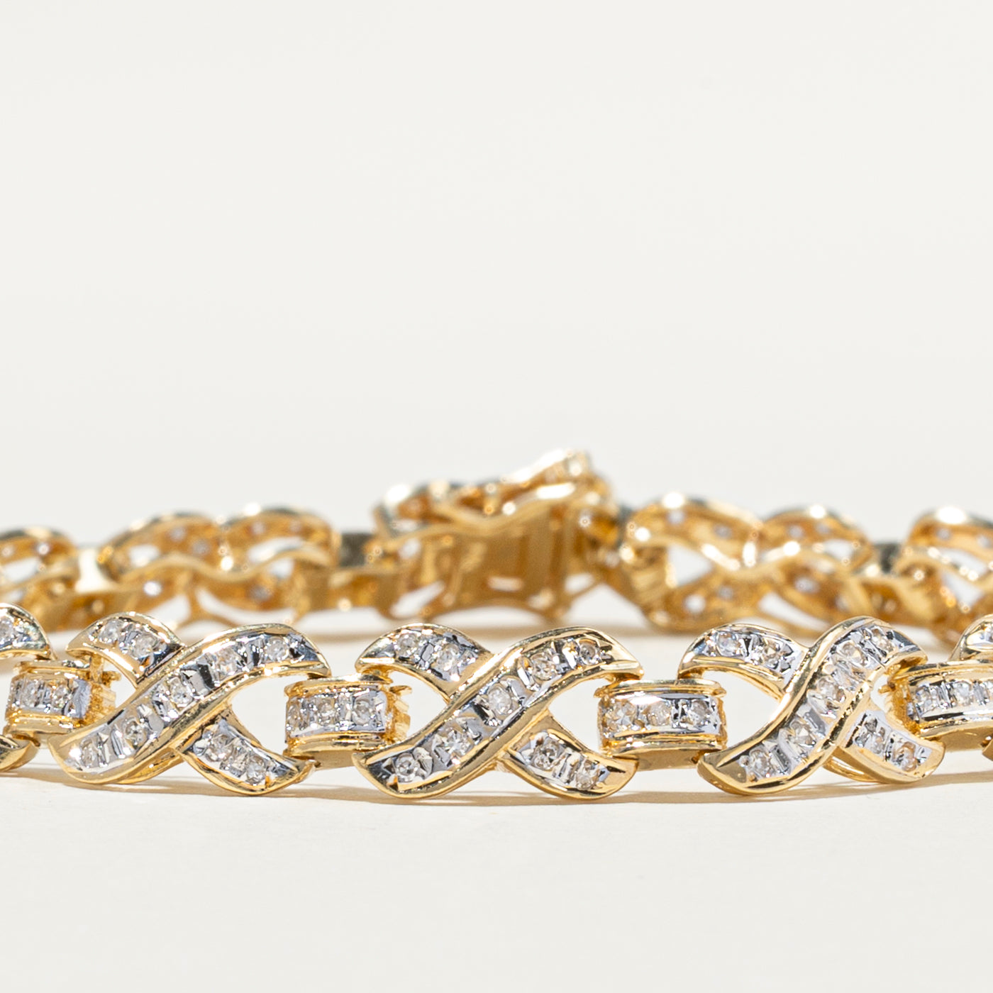 Diamond Cross Over Design Tennis Bracelet | 0.89ctw | 7.25"