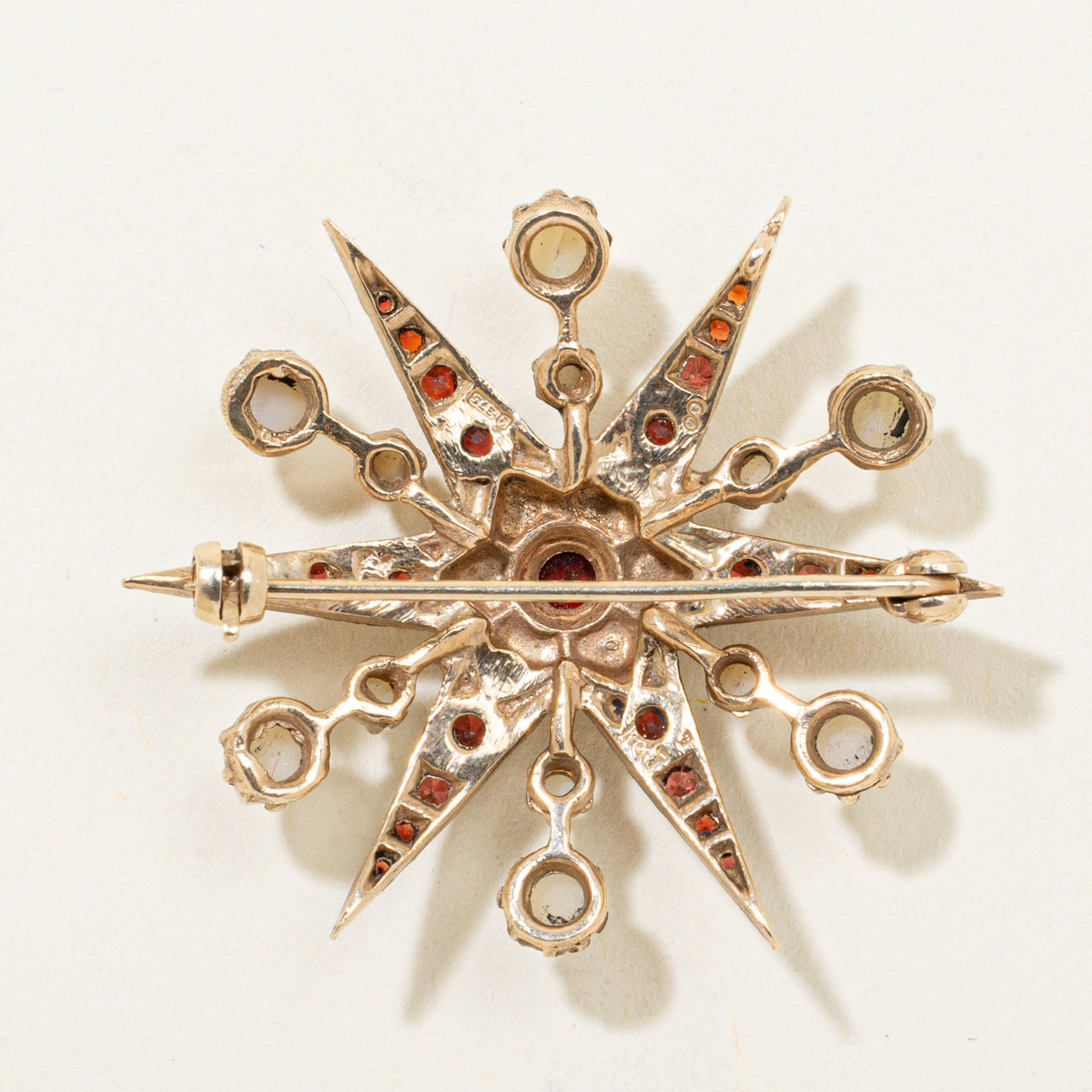 1970 London Garnet & Pearl Sunburst Brooch | 1.20ctw
