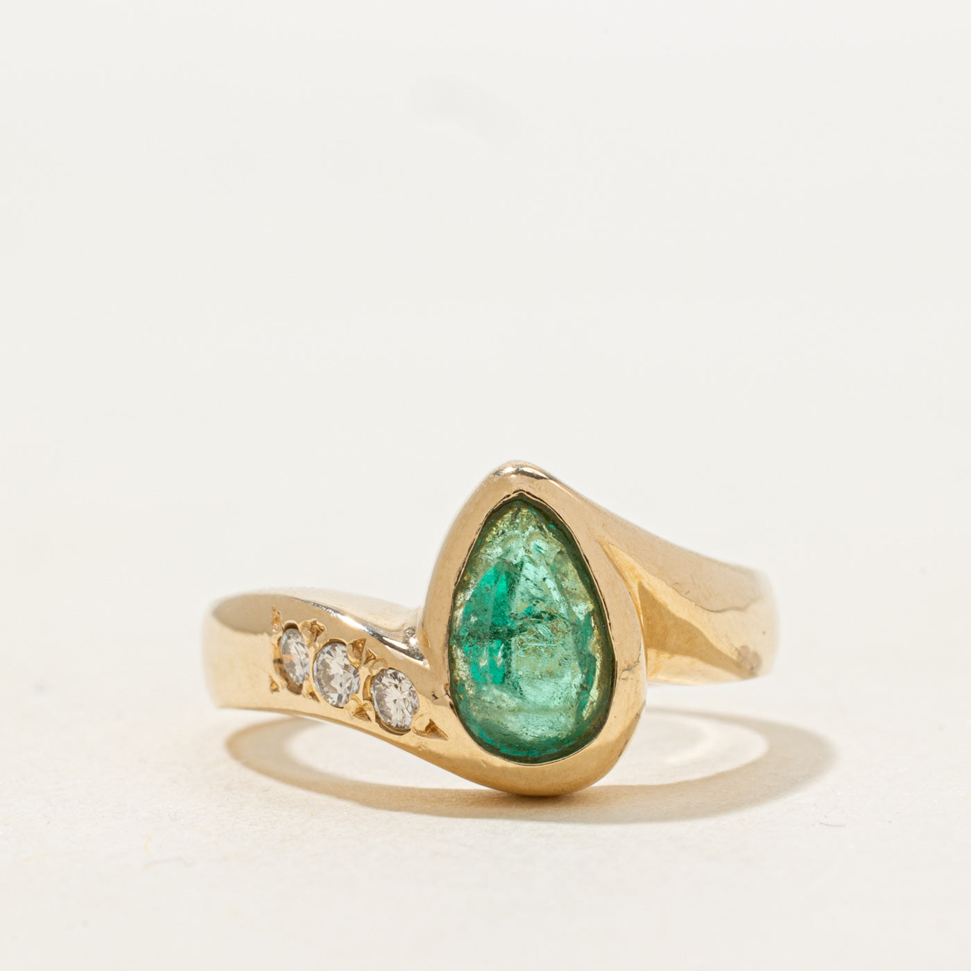 Bezel Set Pear Cut Emerald & Diamond Bypass Ring | 0.8ct, 0.04ctw | SZ 7.0 |