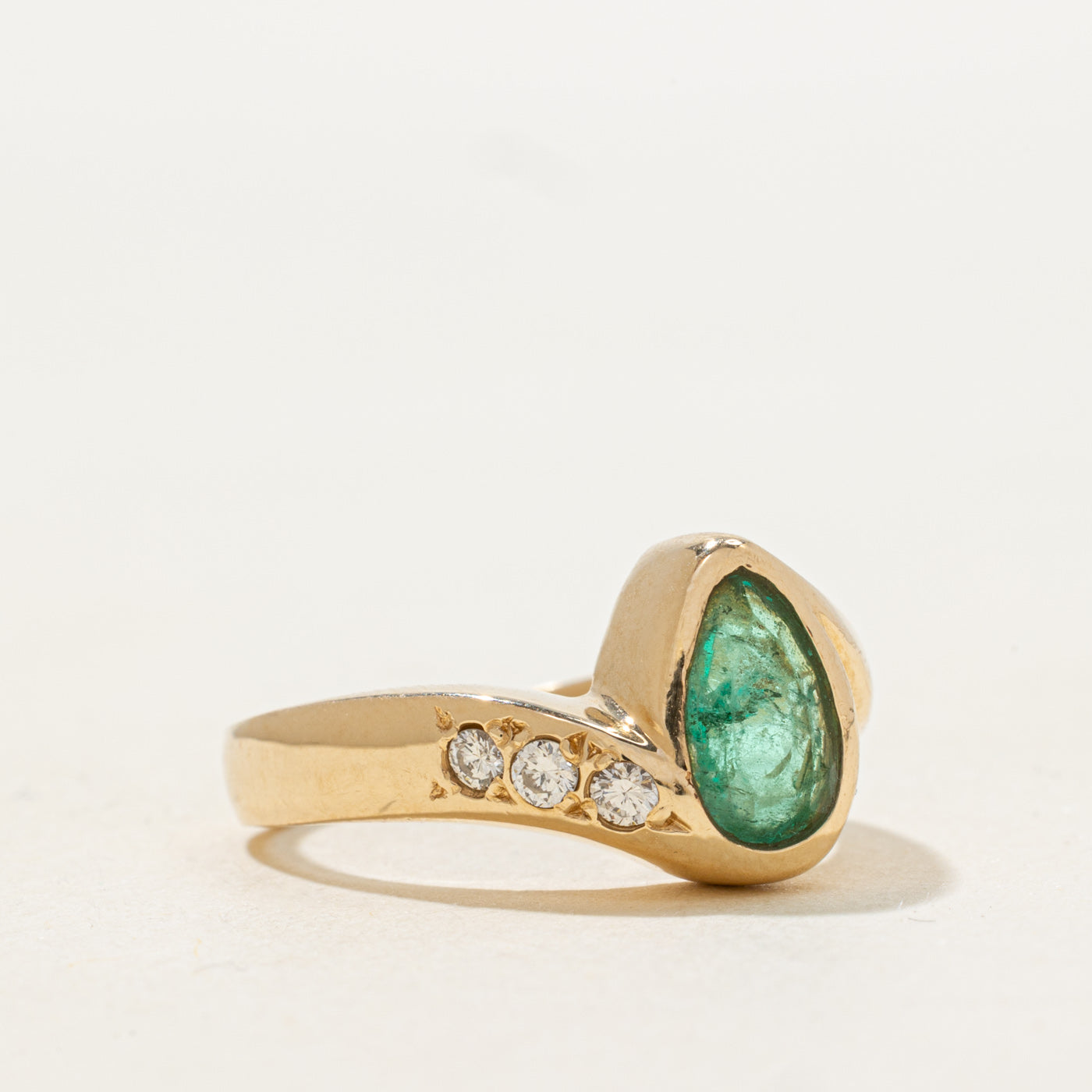 Bezel Set Pear Cut Emerald & Diamond Bypass Ring | 0.8ct, 0.04ctw | SZ 7.0 |