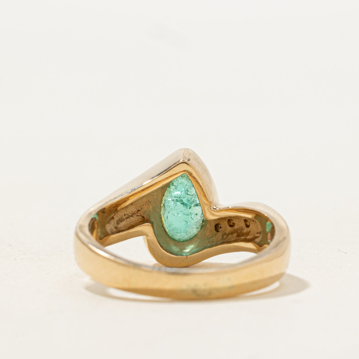 Bezel Set Pear Cut Emerald & Diamond Bypass Ring | 0.8ct, 0.04ctw | SZ 7.0 |