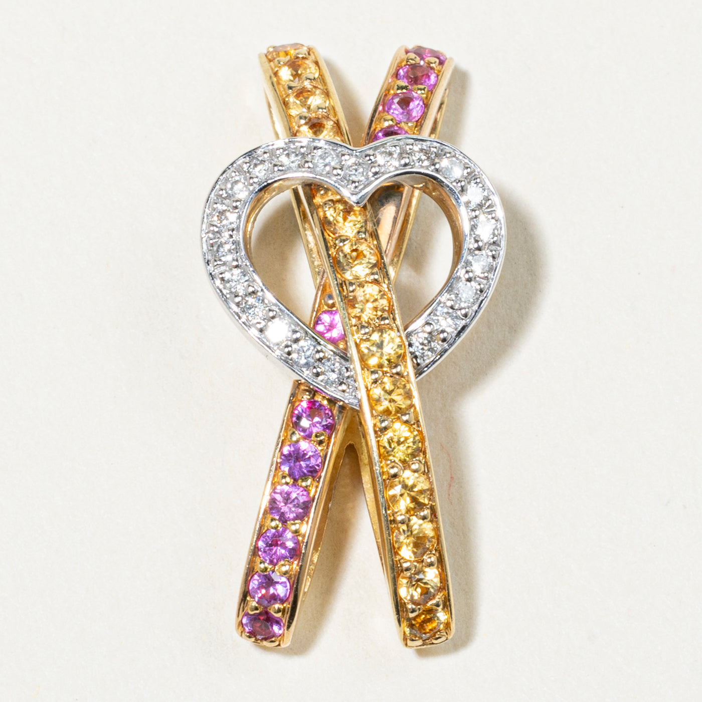 18k Yellow & Pink Sapphire & Diamond Heart Cross Over Pendant | 0.73ctw, 0.17ctw