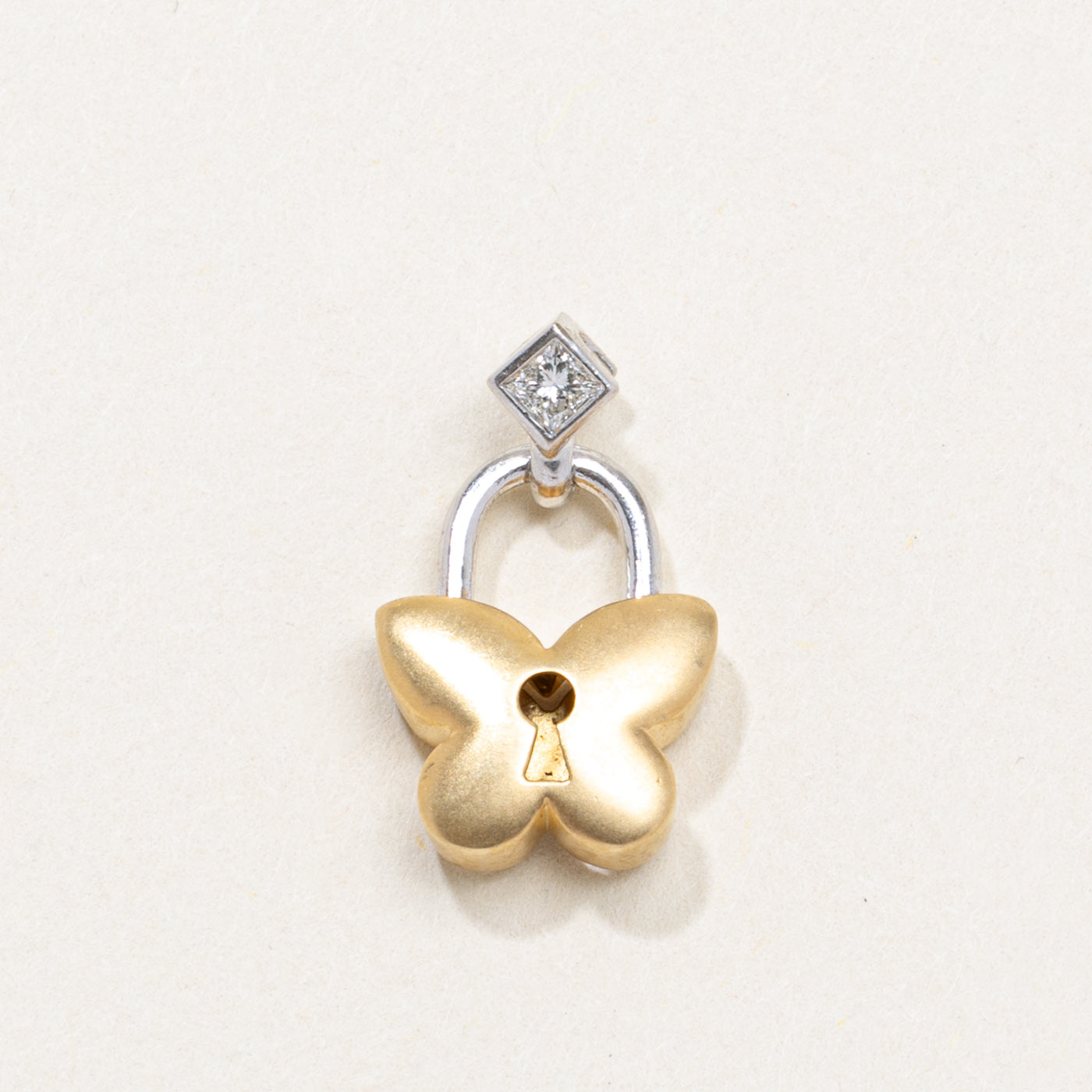Pendentif papillon cadenas en or bicolore 18 carats et diamants