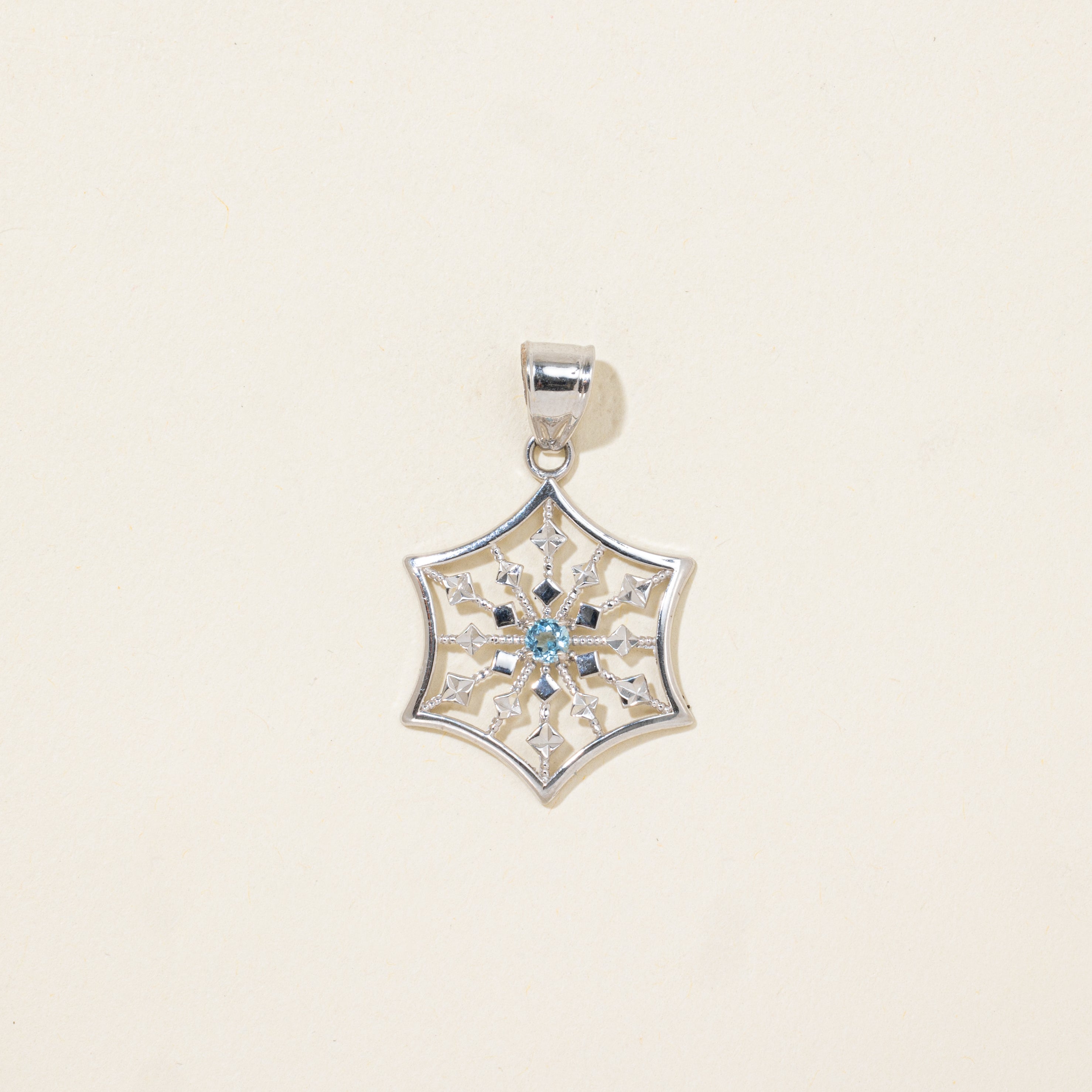White Gold Blue Topaz Snowflake Pendant | 0.10ct