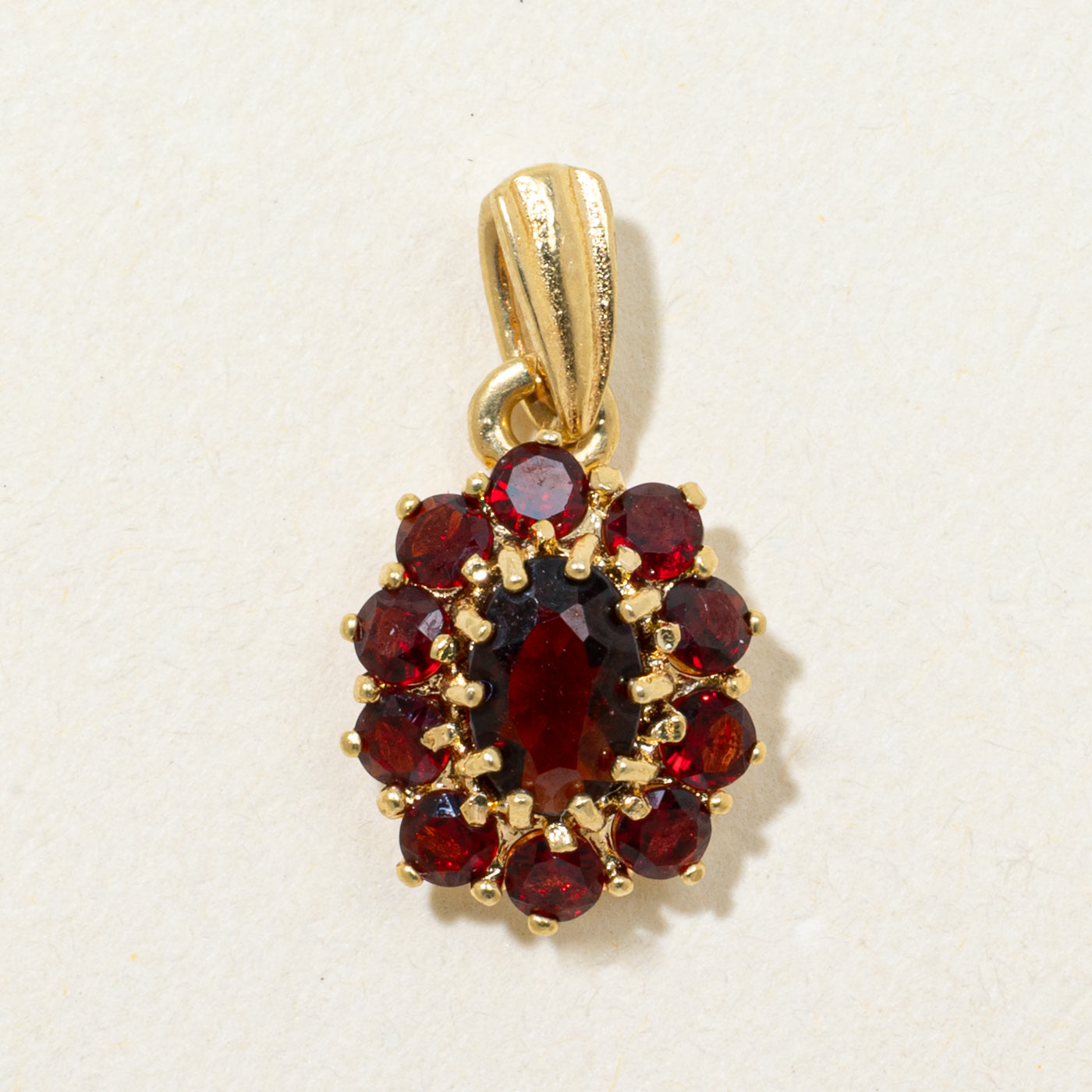 18k Oval Cut Garnet Petal Halo Pendant | 0.82ctw