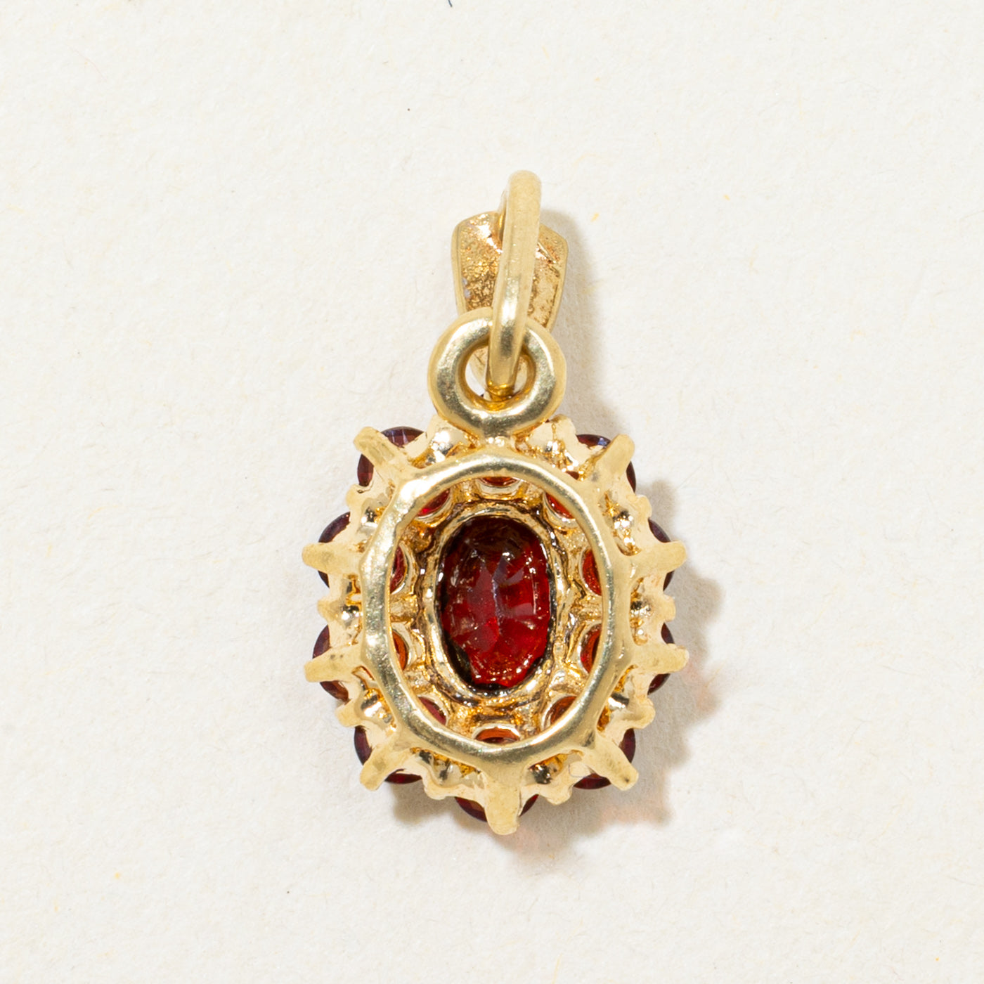 18k Oval Cut Garnet Petal Halo Pendant | 0.82ctw