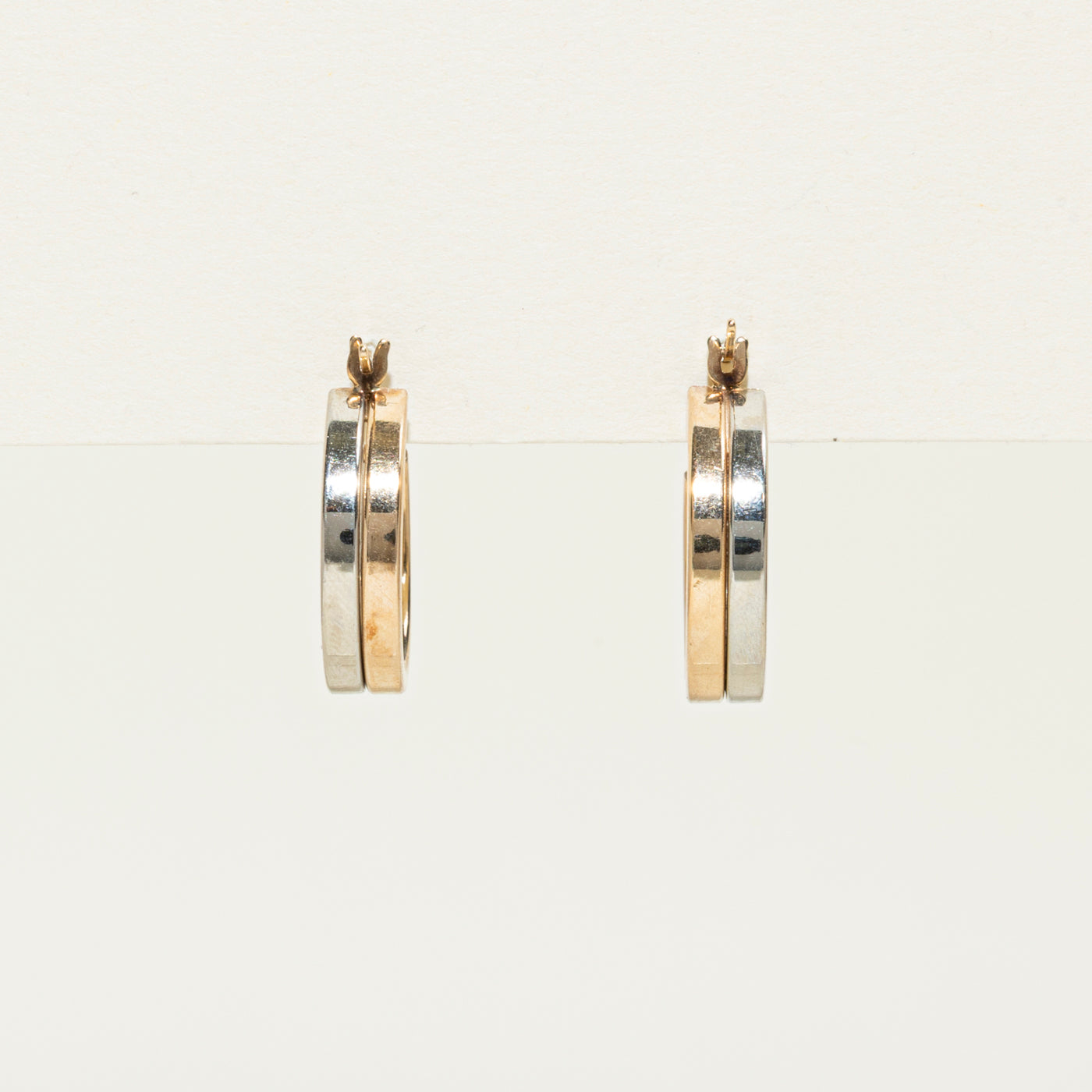 Boucles d'oreilles créoles bicolores en or 10 carats