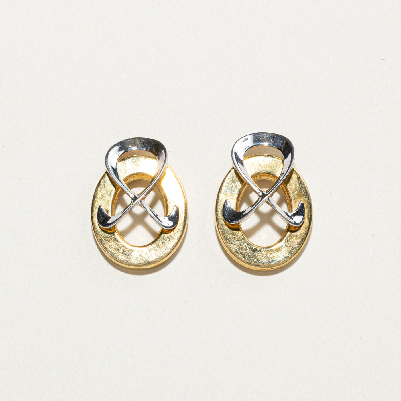 Boucles d'oreilles clous géométriques bicolores en or 18 carats