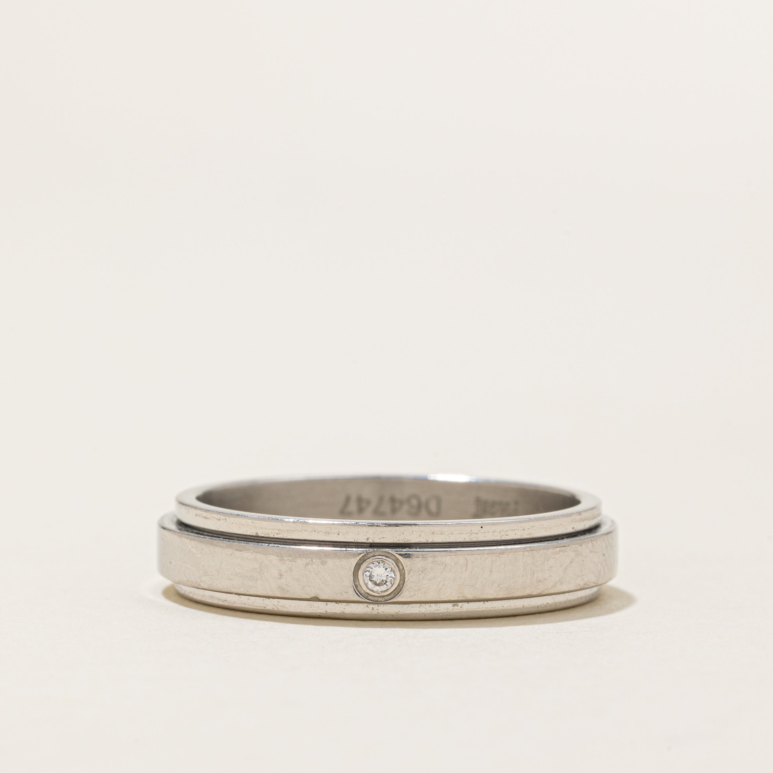 'Piaget' Platinum Possession Ring | 0.01ctw | SZ 9.5 |