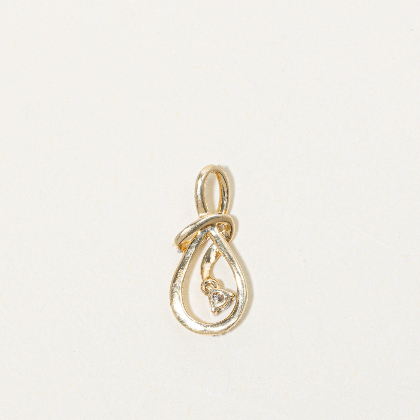 10k Diamond Infinity Swirl Pendant