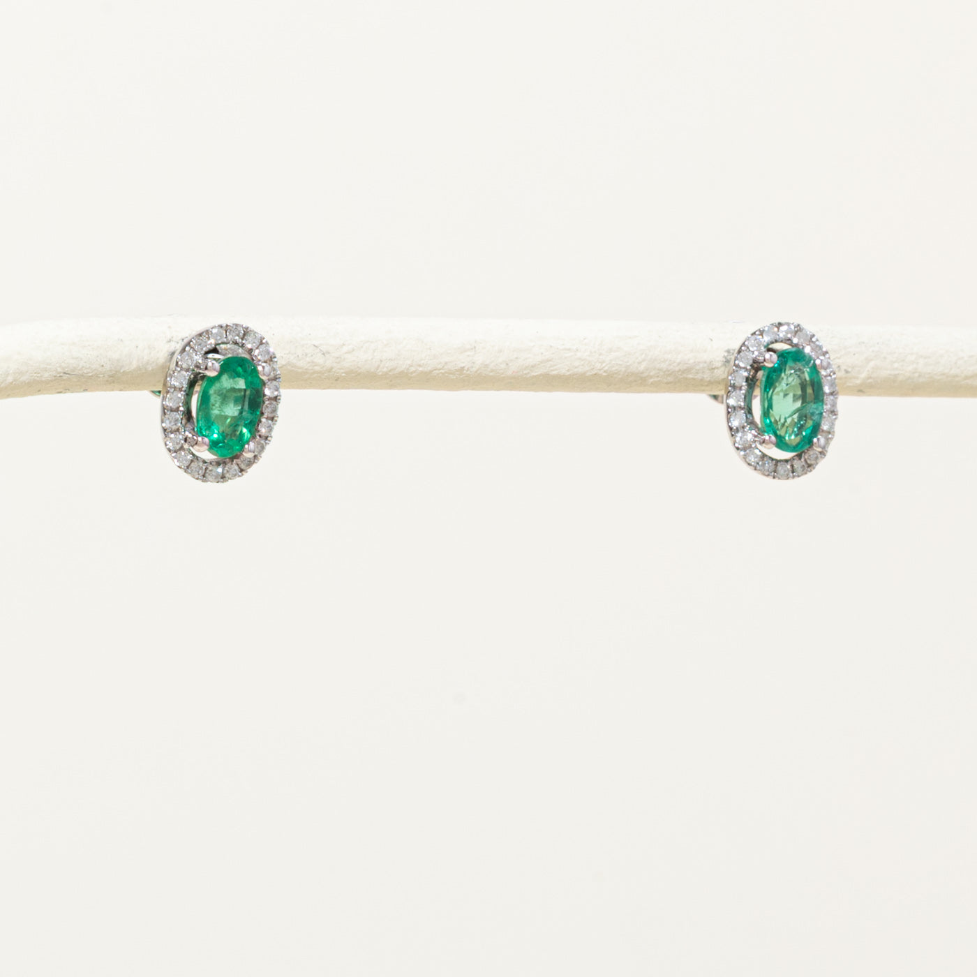 18k Oval Cut Emerald & Diamond Halo Earrings | 0.70ctw, 0.08ctw
