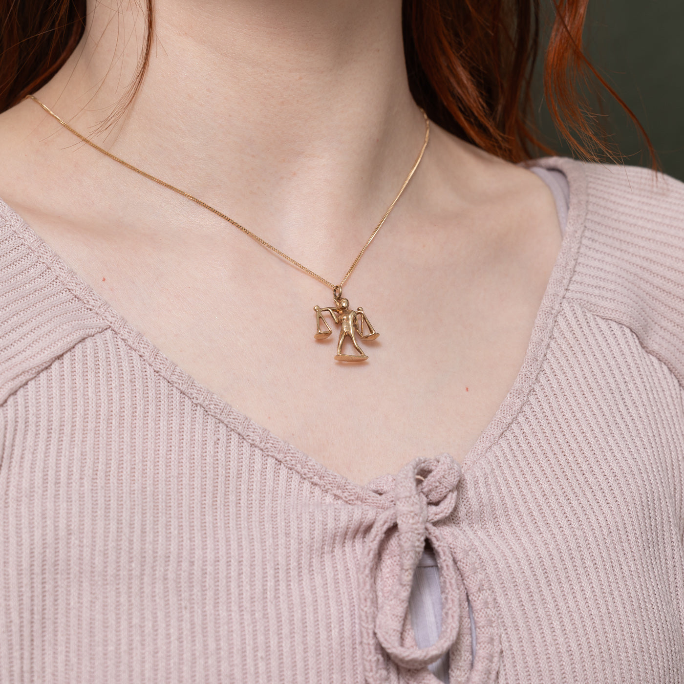 10k Man Carrying Scales Pendant