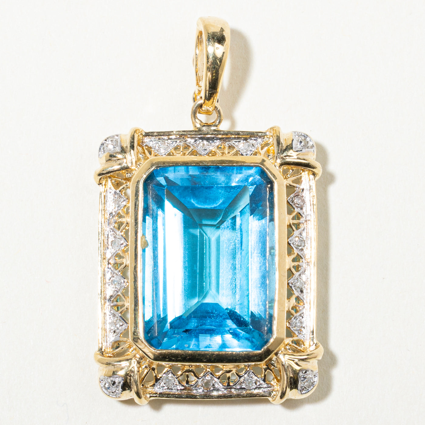14k Blue Topaz & Diamond Ornate Halo Pendant | 21.42ct, 0.09ctw