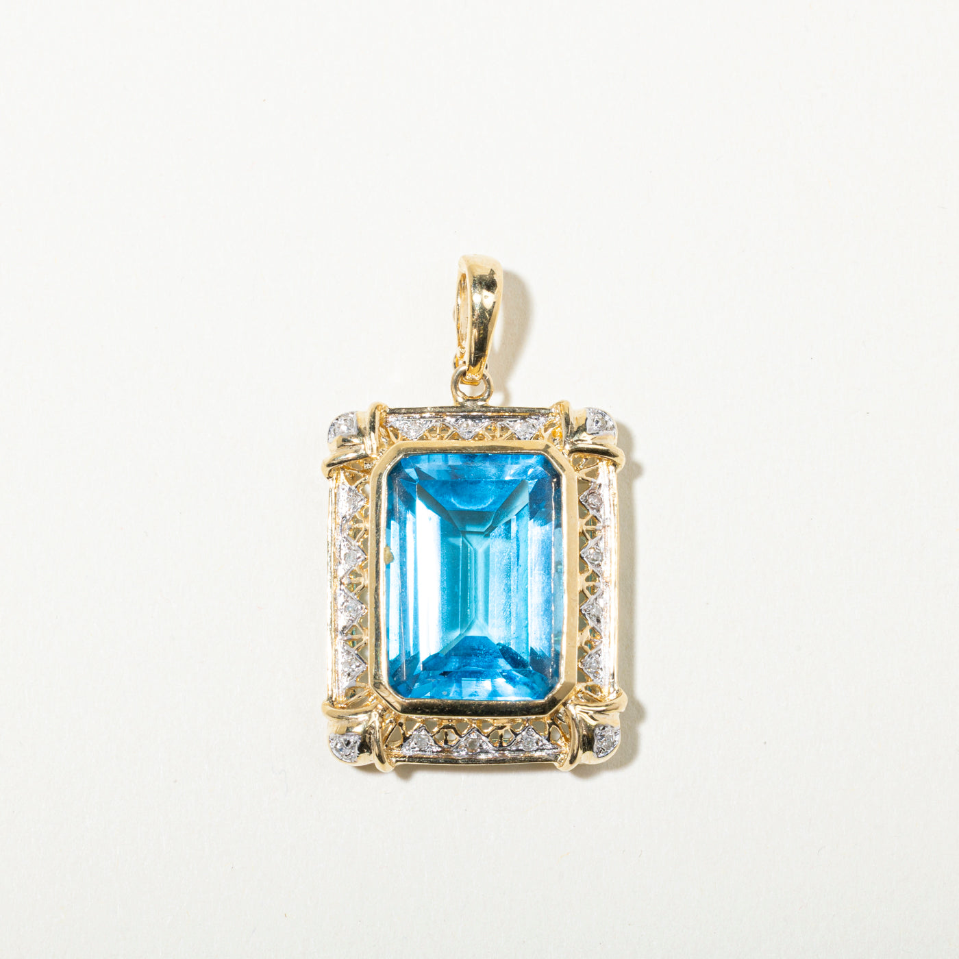 14k Blue Topaz & Diamond Ornate Halo Pendant | 21.42ct, 0.09ctw