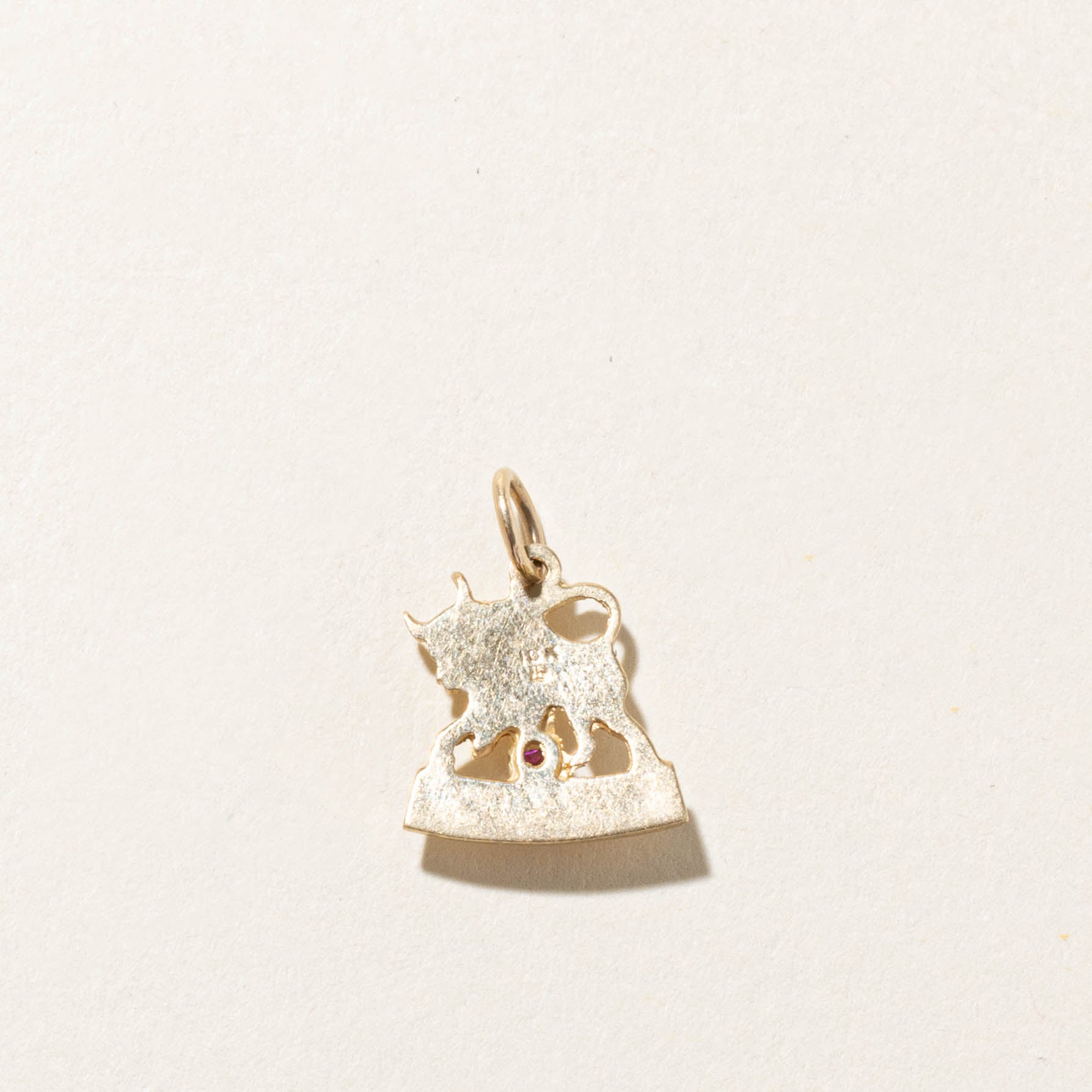 10k Synthetic Ruby Taurus Zodiac Charm