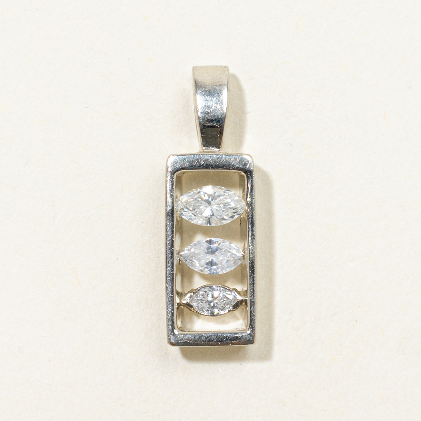 Tension Set Three Stone Marquise Cut Diamond Pendant | 0.58ctw