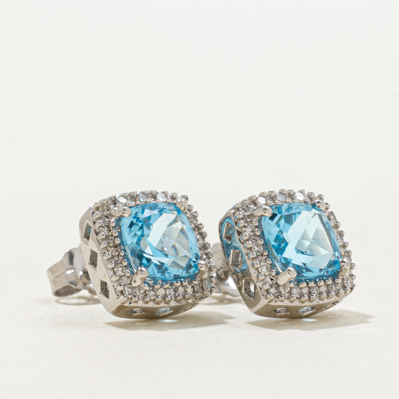 Blue Topaz & Diamond Halo Stud Earrings | 2.00ctw, 0.07ctw