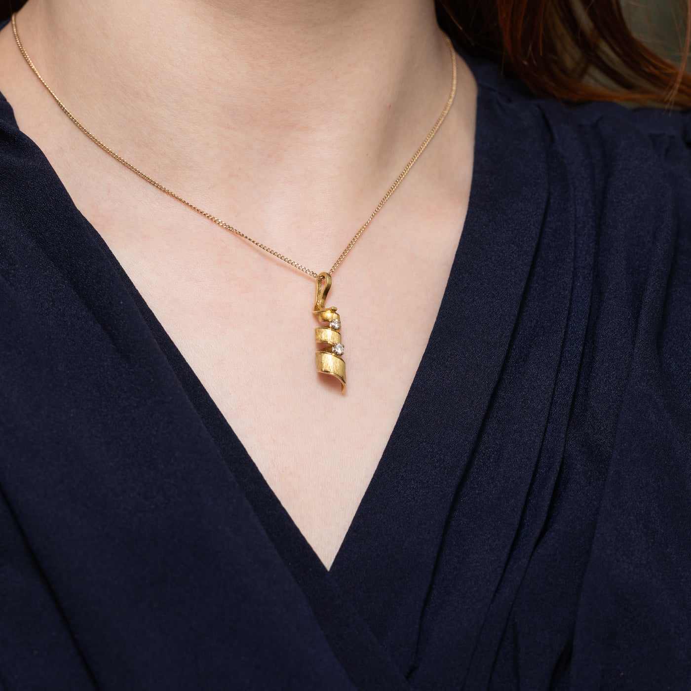 Two Stone Diamond Swirl Pendant | 0.15ctw
