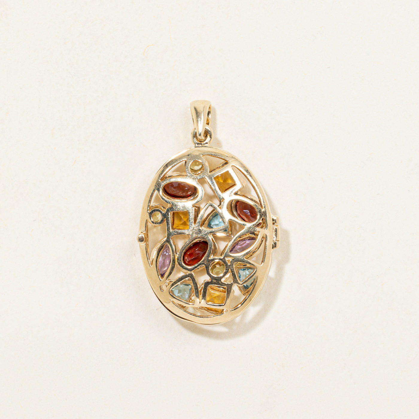 Pendentif en or 10 carats serti de plusieurs pierres précieuses | 2,00 ct au total