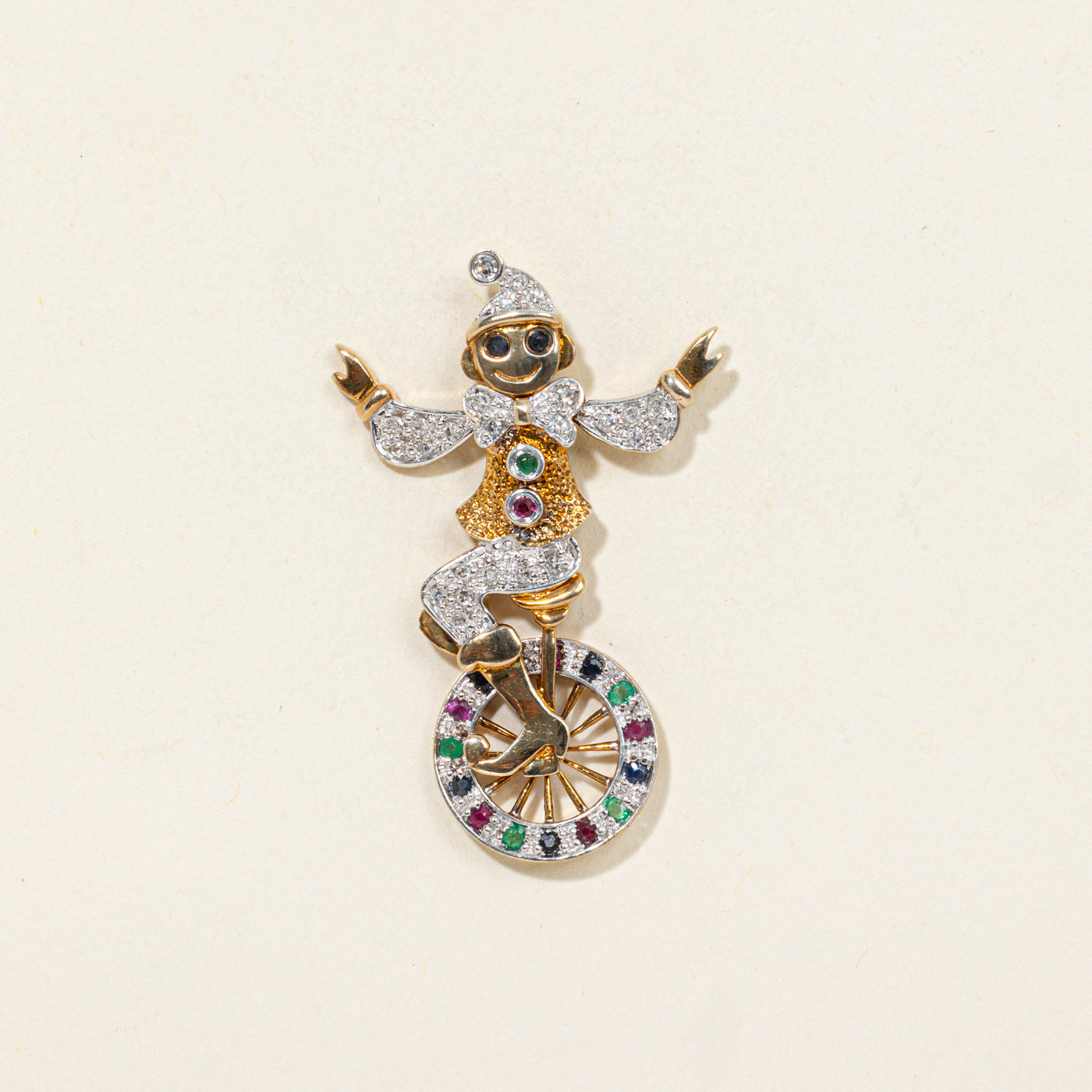 Pendentif Clown sur monocycle en or 9 carats et pierres précieuses multiples | 0,25 ct, 0,13 ct