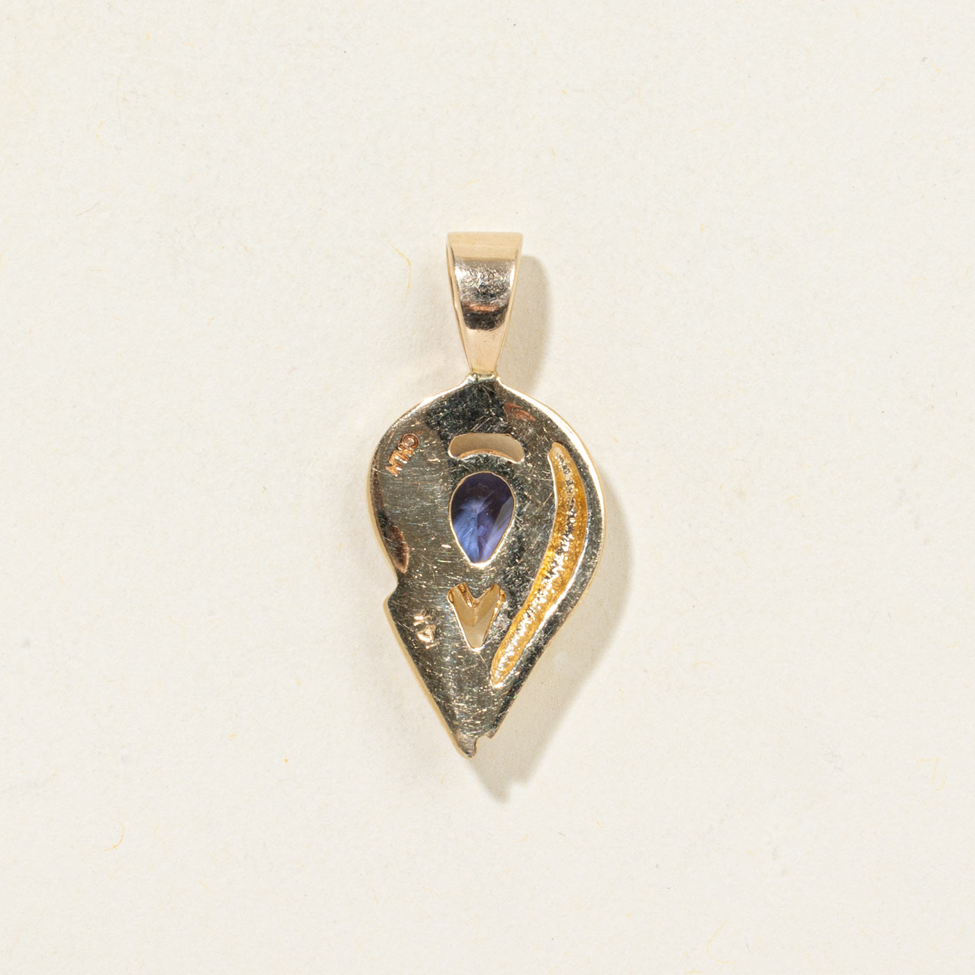 14K Pear Cut Tanzanite Abstract Pendant | 0.90ct