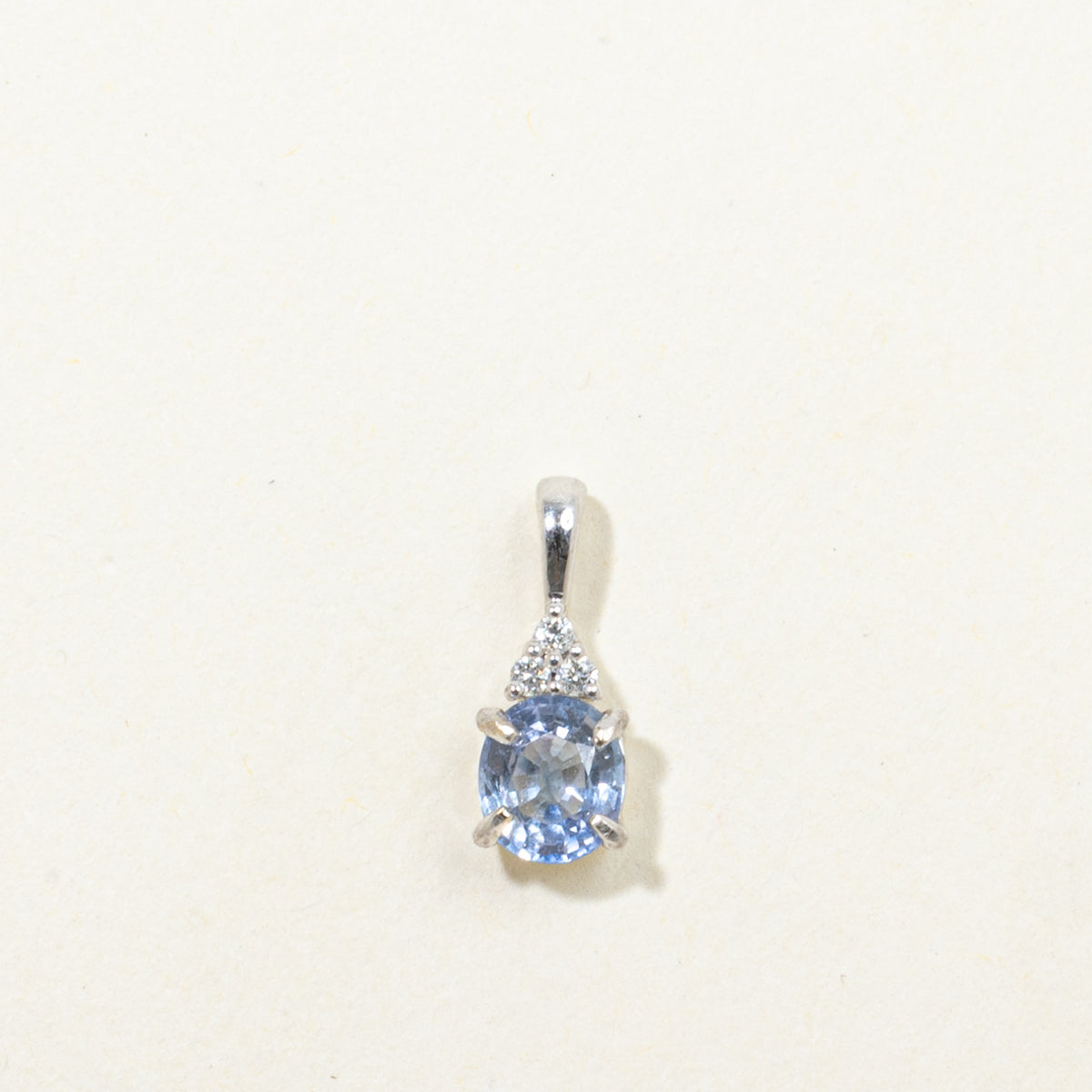 14k Oval Cut Sapphire & Diamond Accented Pendant | 0.63ct, 0.03ctw