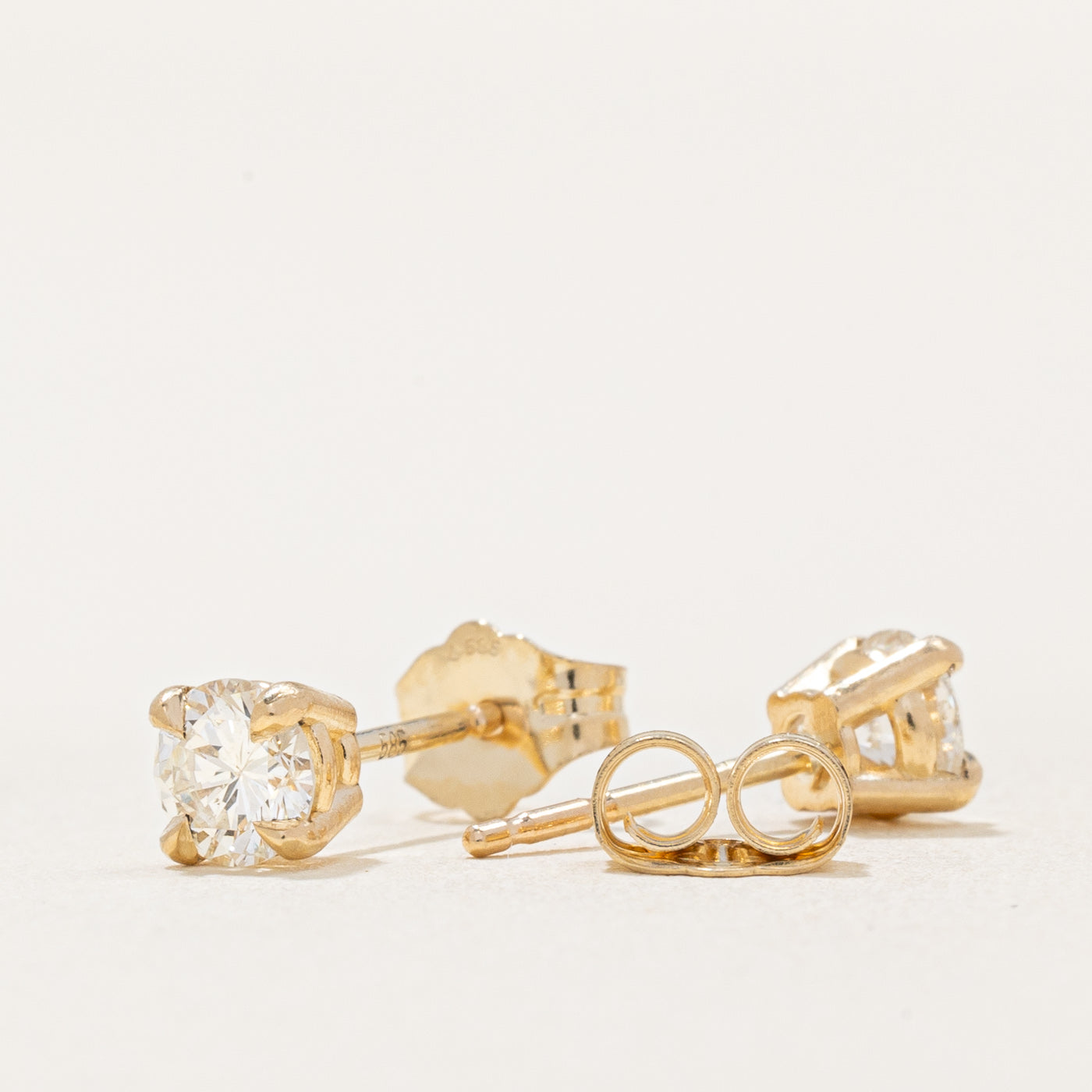 '100 Ways' Diamond Stud Earrings | 0.58ctw SI1/SI2 J/K |