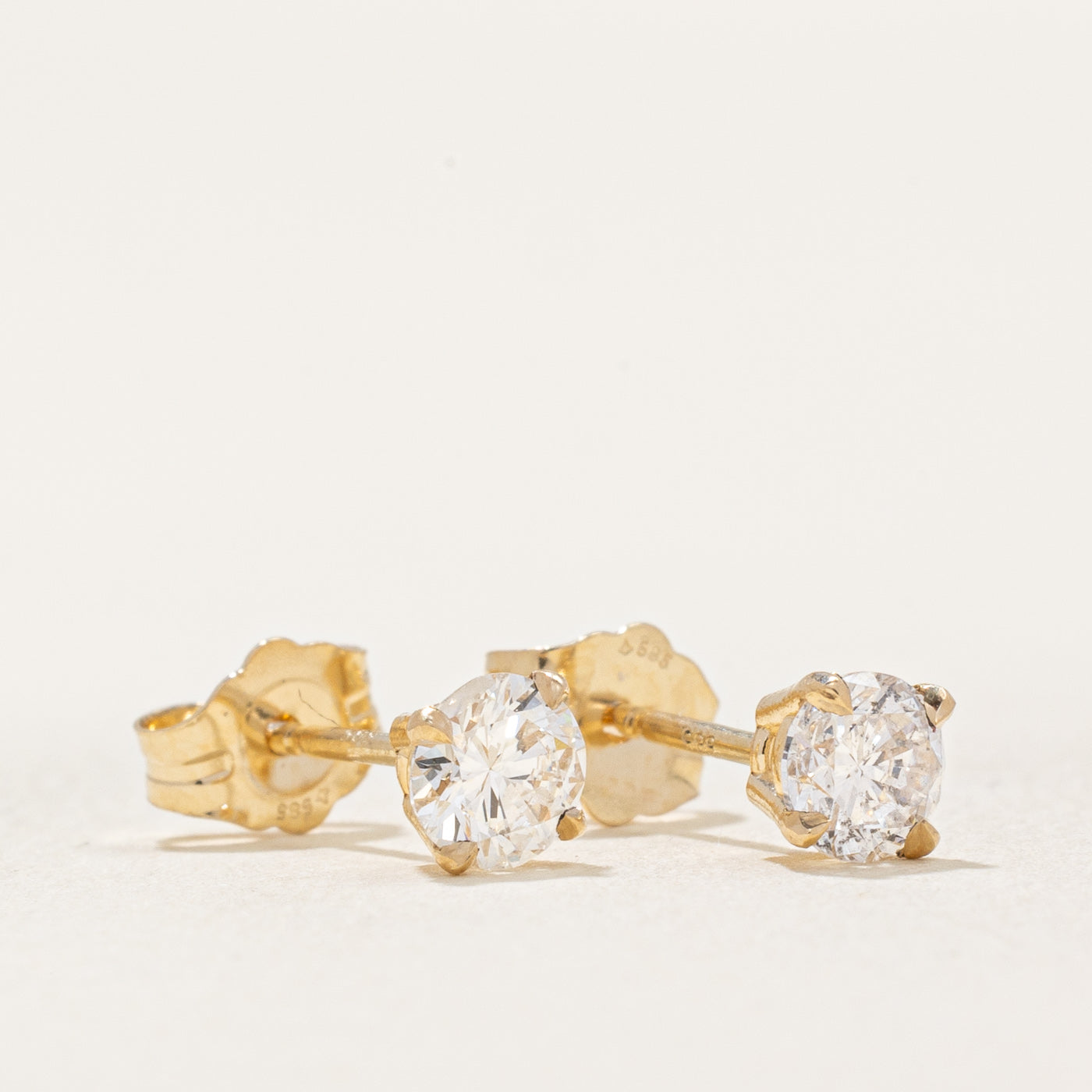 '100 Ways' Diamond Stud Earrings | 0.58ctw I1/I2 D-F |