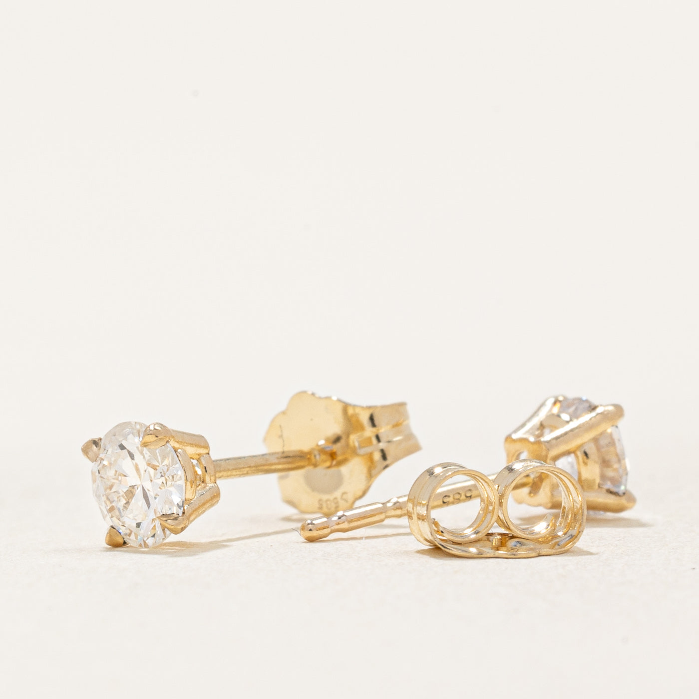 '100 Ways' Diamond Stud Earrings | 0.58ctw I1/I2 D-F |