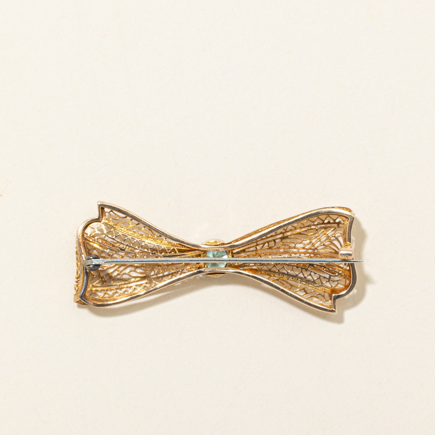 Bezel Set Blue Zircon Filigree Bow Brooch | 1.10ct