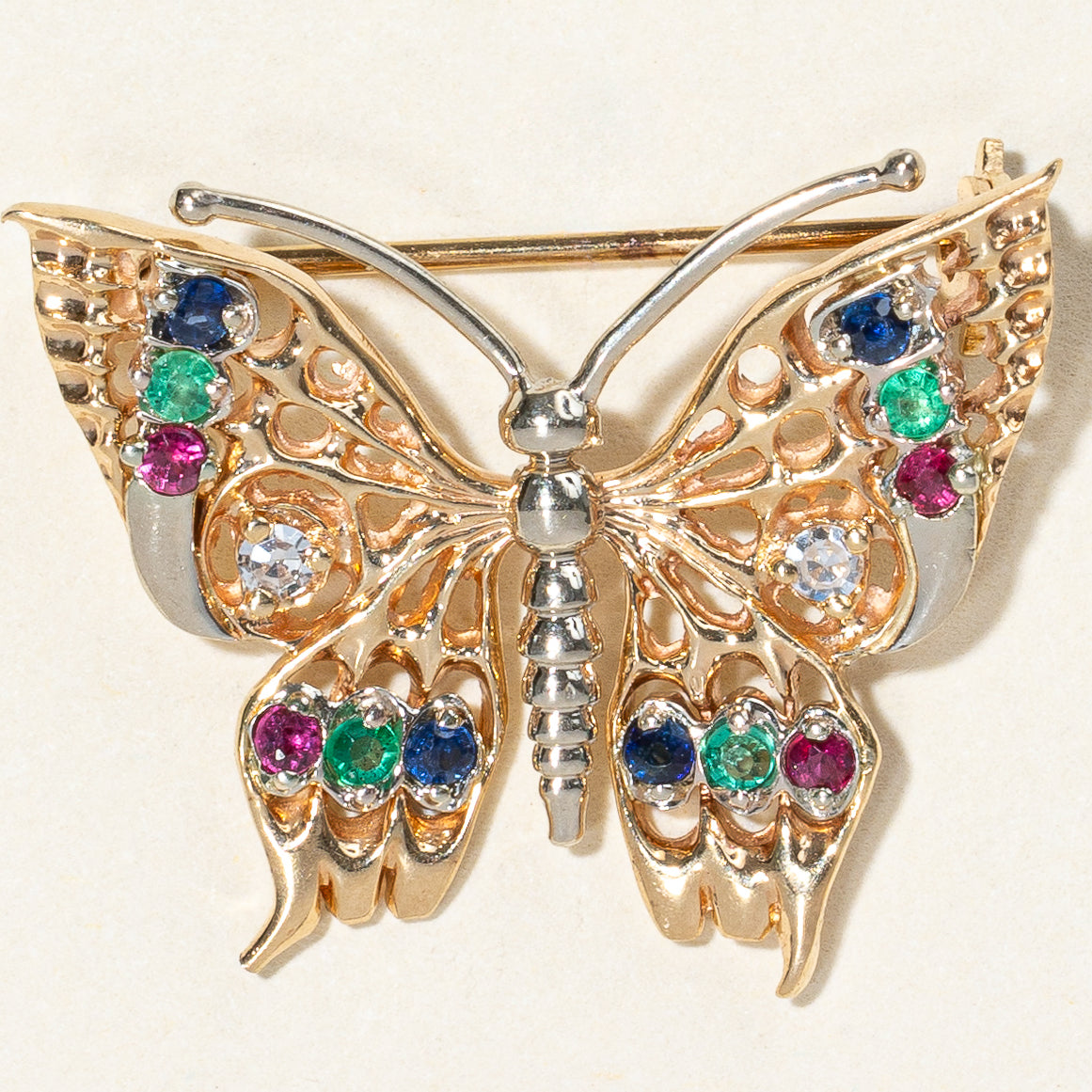 Broche papillon multi-pierres | 0,24 ct |