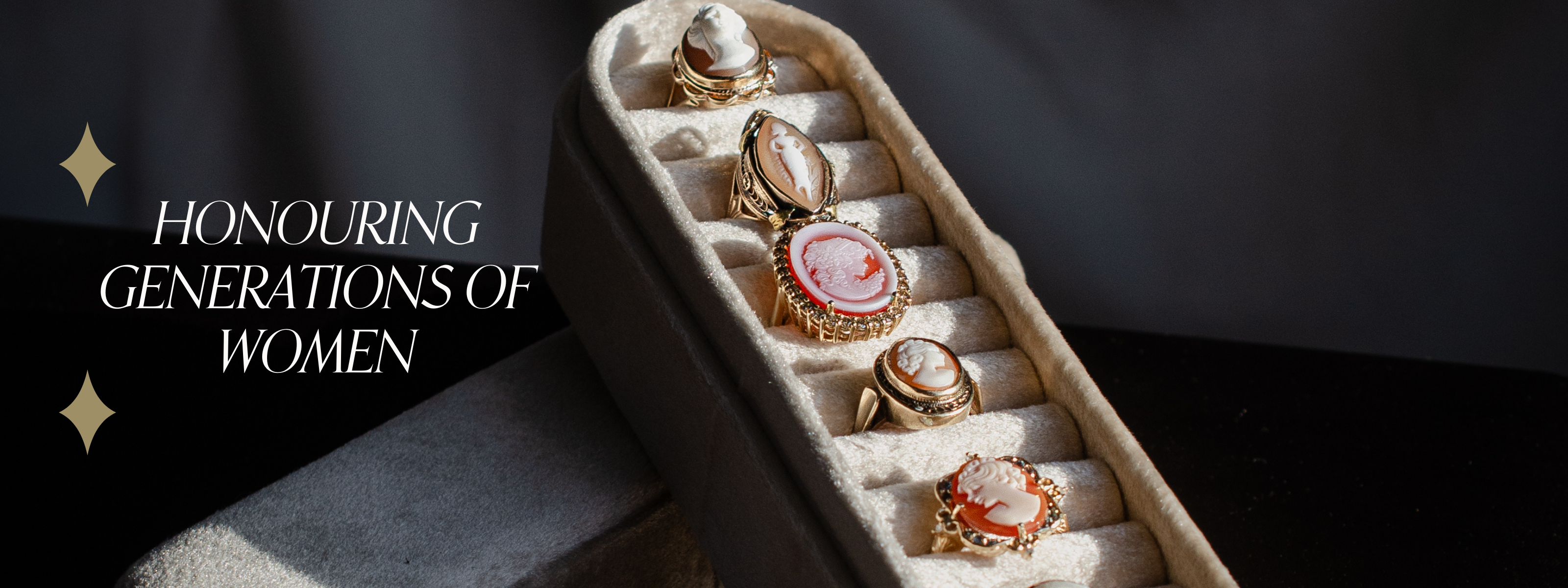 Collection of vintage preloved cameo jewellery rings in yellow gold settings, featuring hand-carved shell cameo portraits of women displayed in a ivory velvet ring tray. Text reads: Honouring generations of women