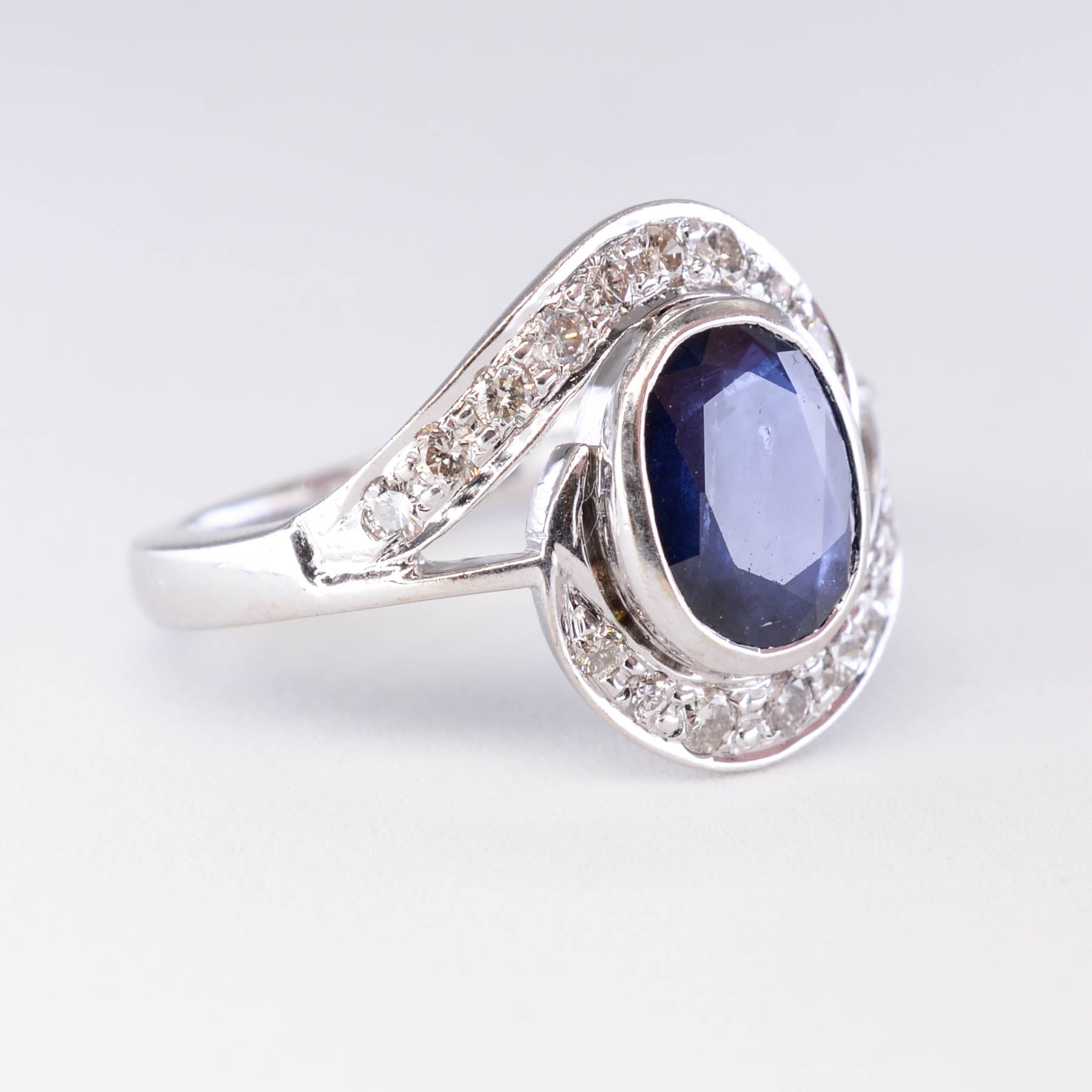 T.K. Anderson's Sapphire and Diamond Bypass Ring | 1.60 ct Sapphire, 0.38ctw DIamonds SZ 7 |