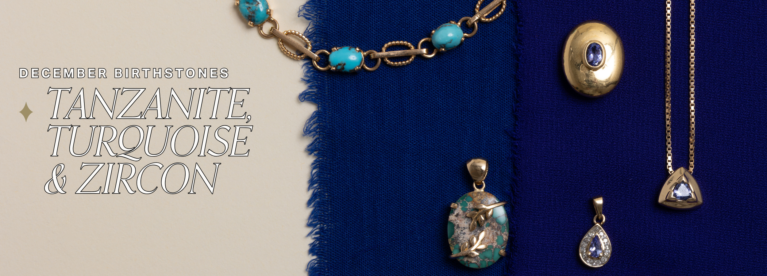 Vintage December birthstone jewellery featuring preloved tanzanite, turquoise, and zircon pieces styled on deep blue fabric.