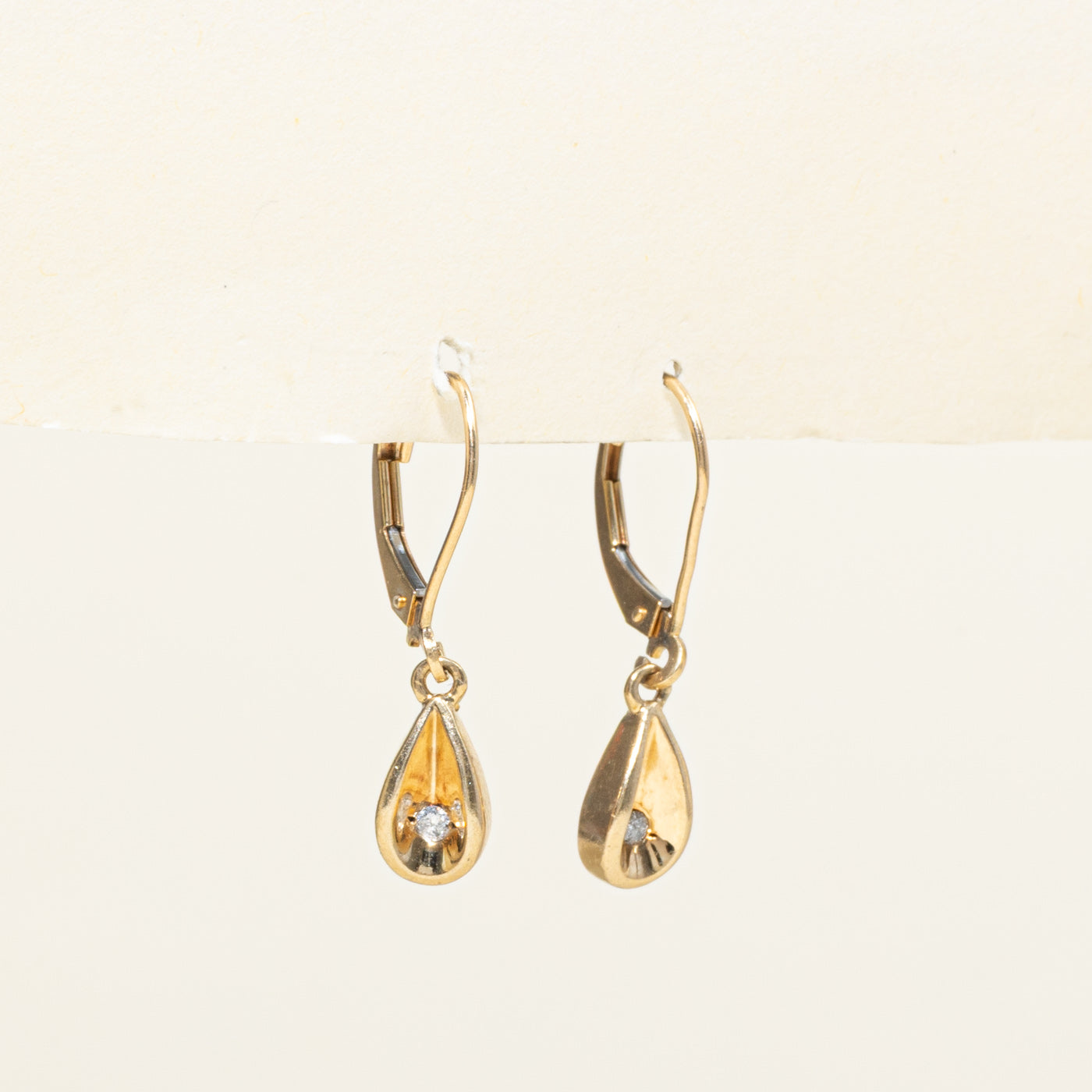 Single Diamond Pear Shaped Drop Earrings