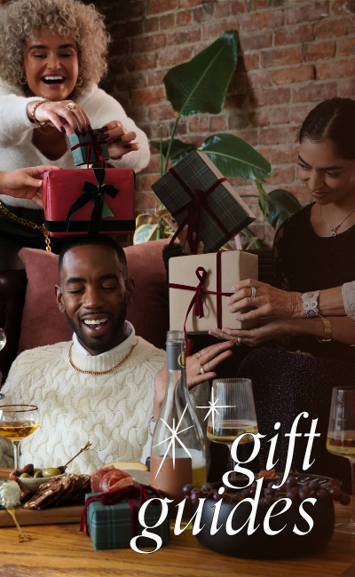 People exchanging gifts, laughing, smiling and having fun. Text reads: gift guides