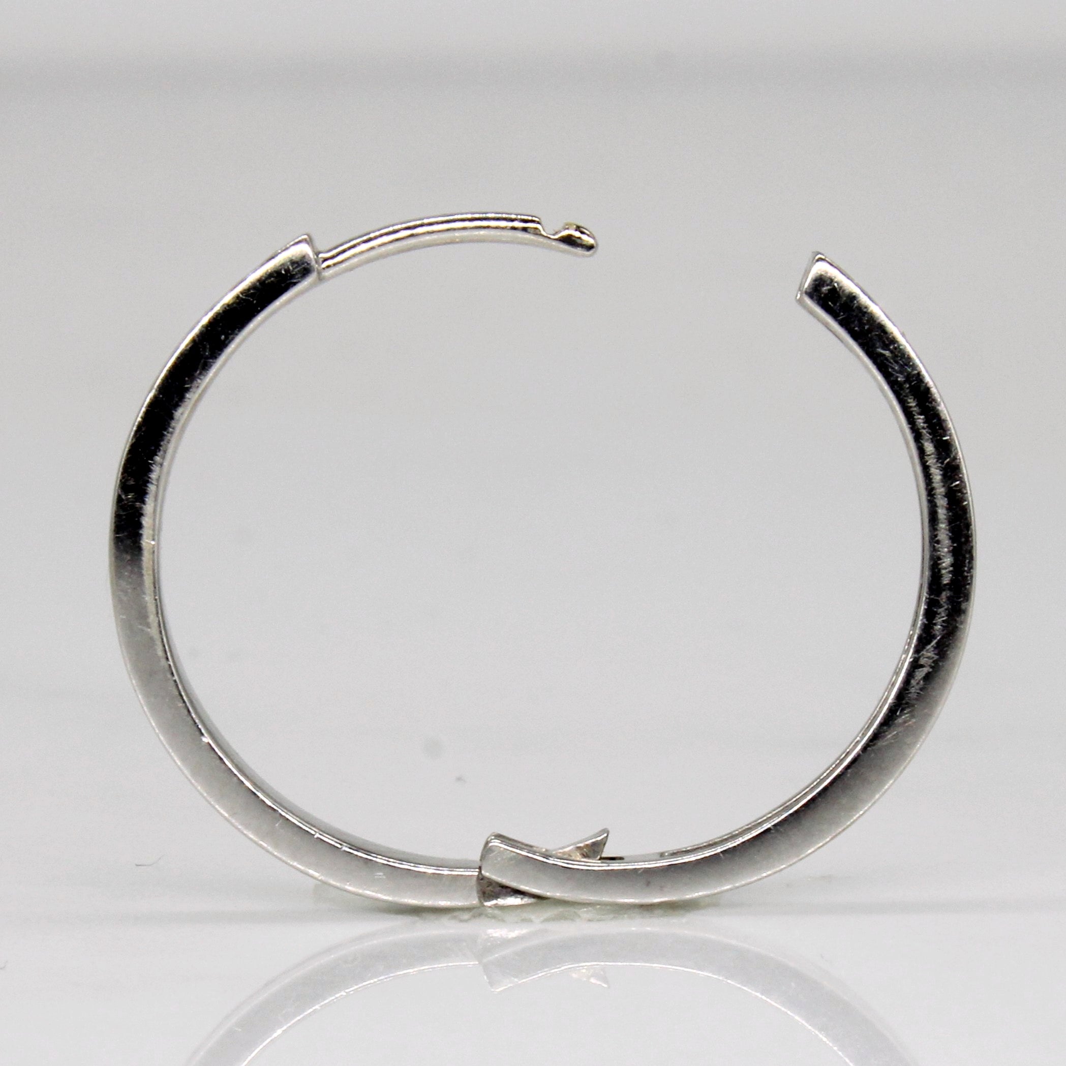 Boucles d'oreilles créoles serties de diamants en canal | 0,24 ct au total |