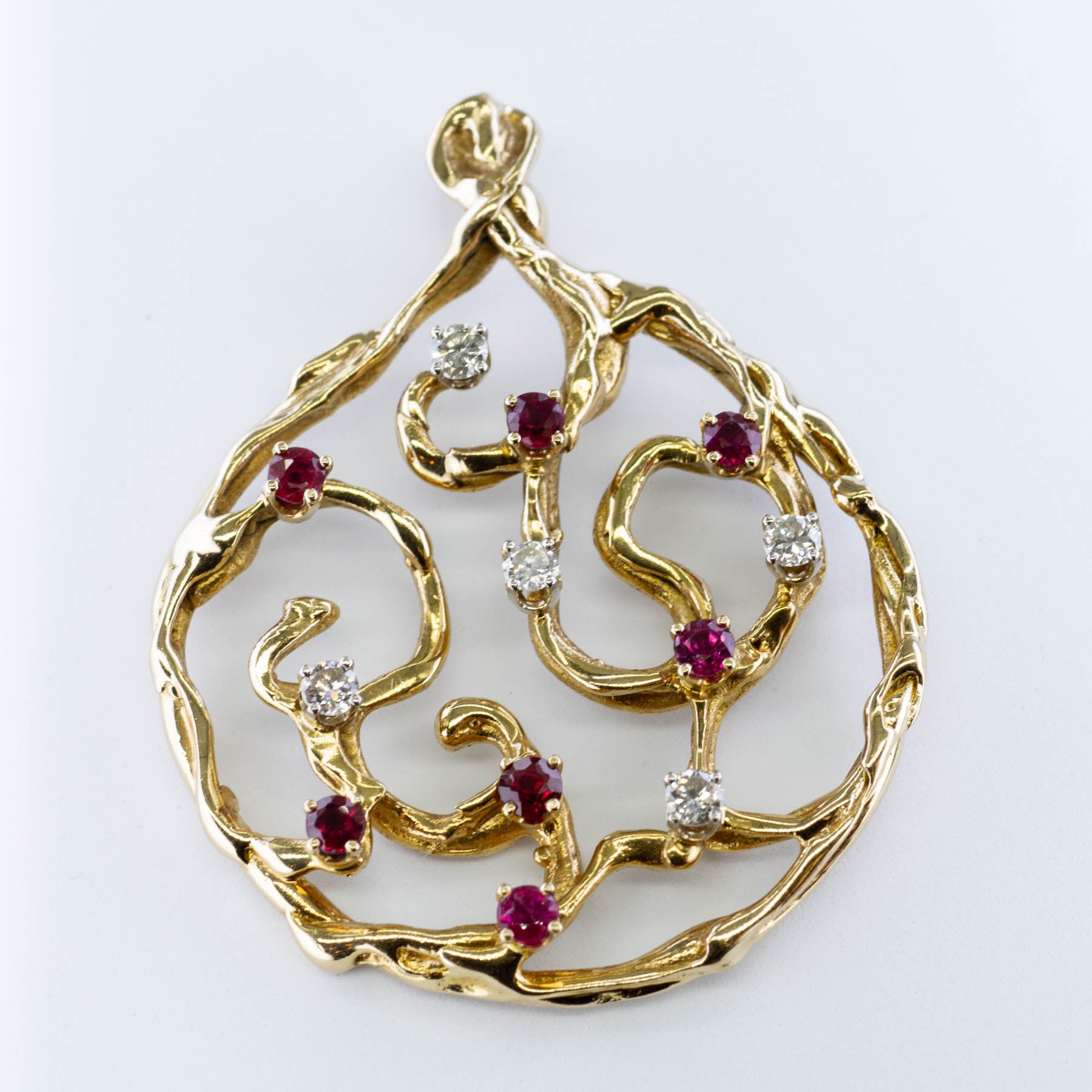 Intertwined Ruby & Diamond Pendant | 0.63ctw | 0.35ctw |