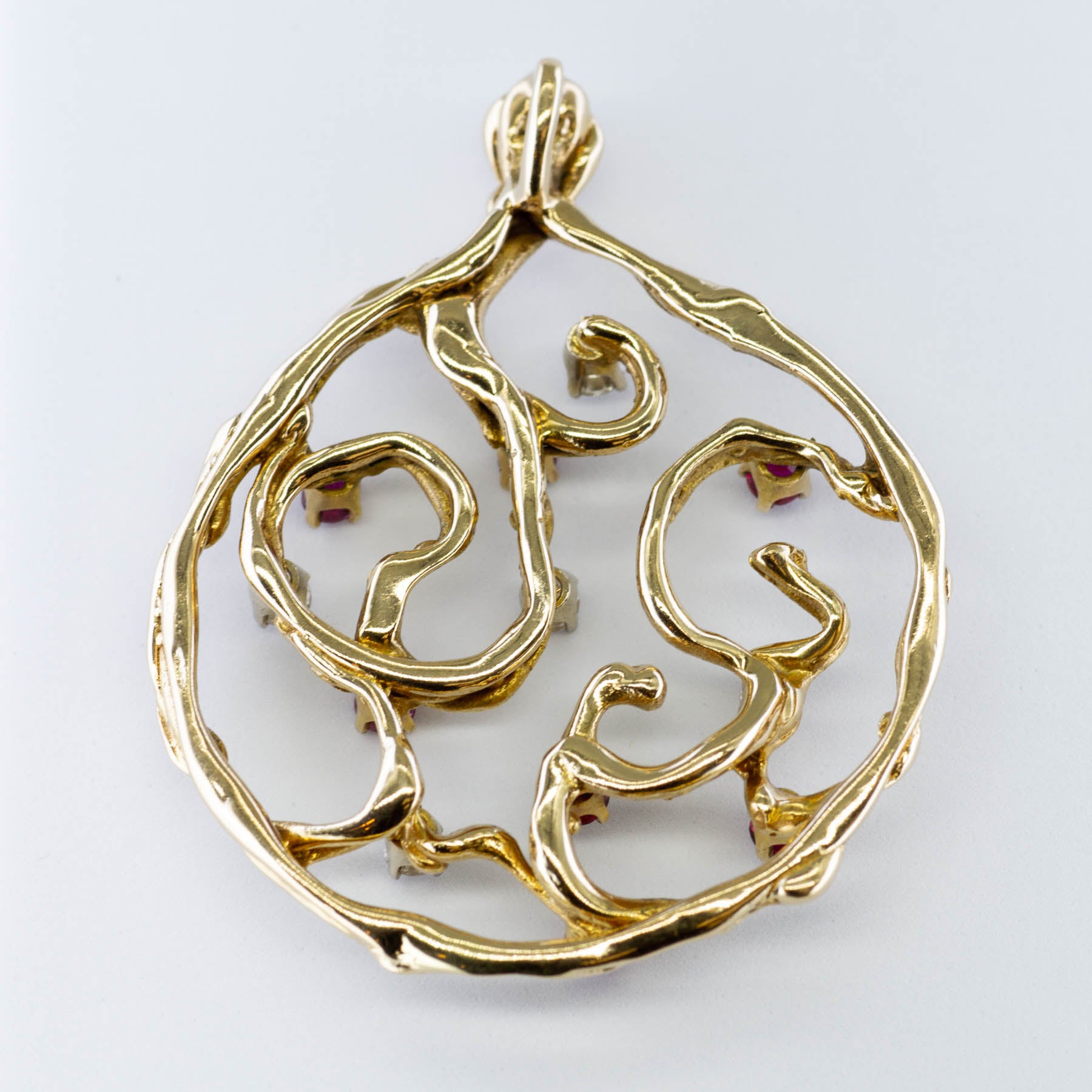 Intertwined Ruby & Diamond Pendant | 0.63ctw | 0.35ctw |
