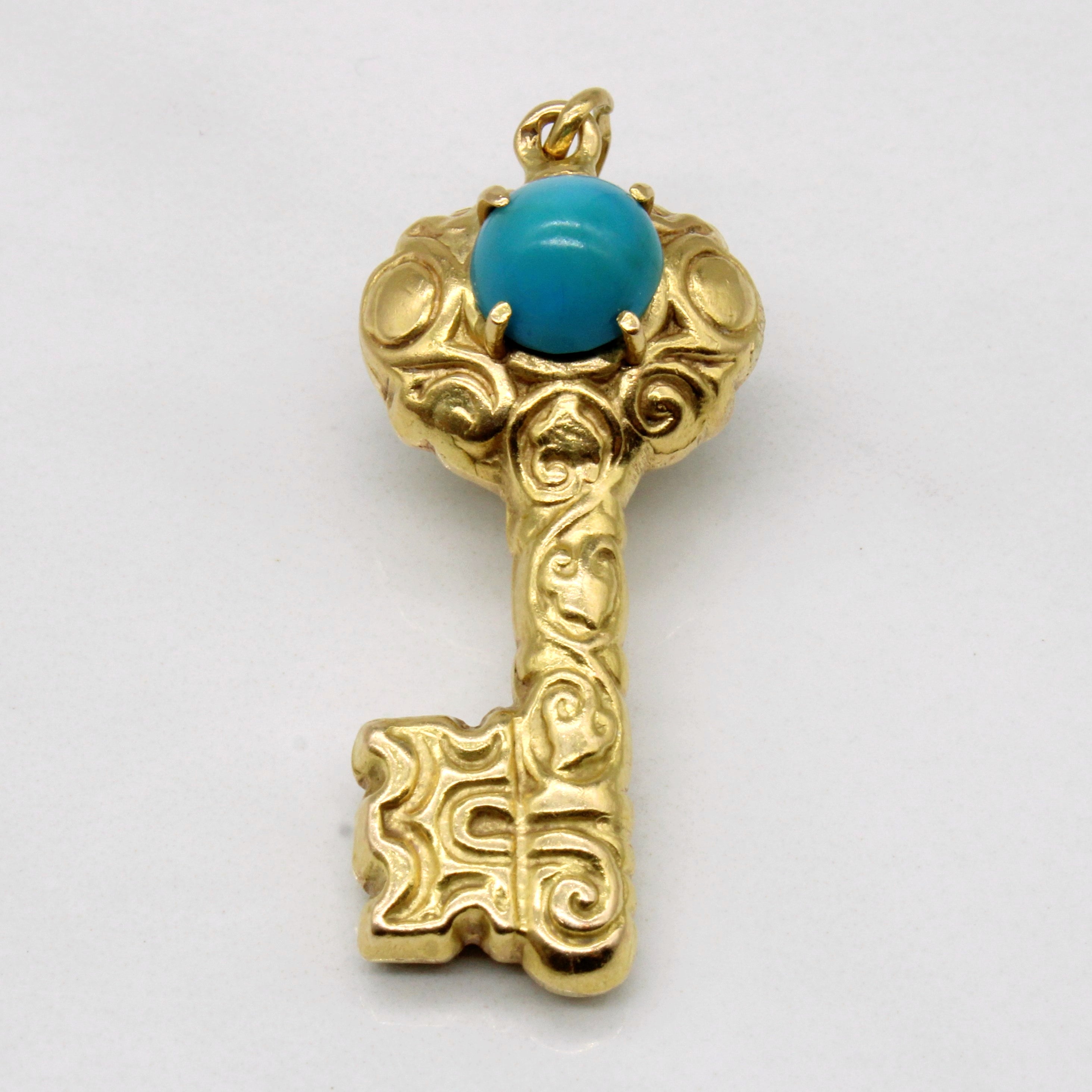 Breloque clé en or jaune 18 carats et turquoise | 3,15 ct |