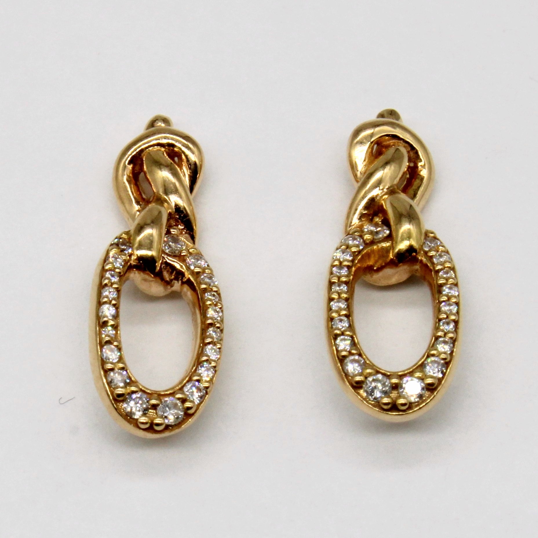 Boucles d'oreilles en or jaune 18 carats et diamants | 0,15 ct au total |